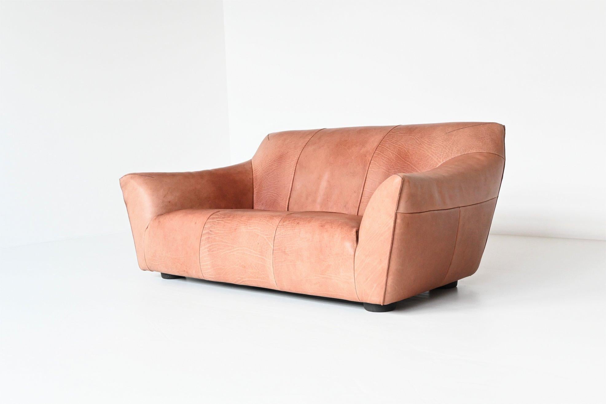Fantastic shaped and very comfortable lounge sofa model Mancha designed by Gerard van den Berg for Label, The Netherlands 1990. The Mancha welcomes you with open arms. It is a compact sofa with a generous appearance. The thick buffalo leather