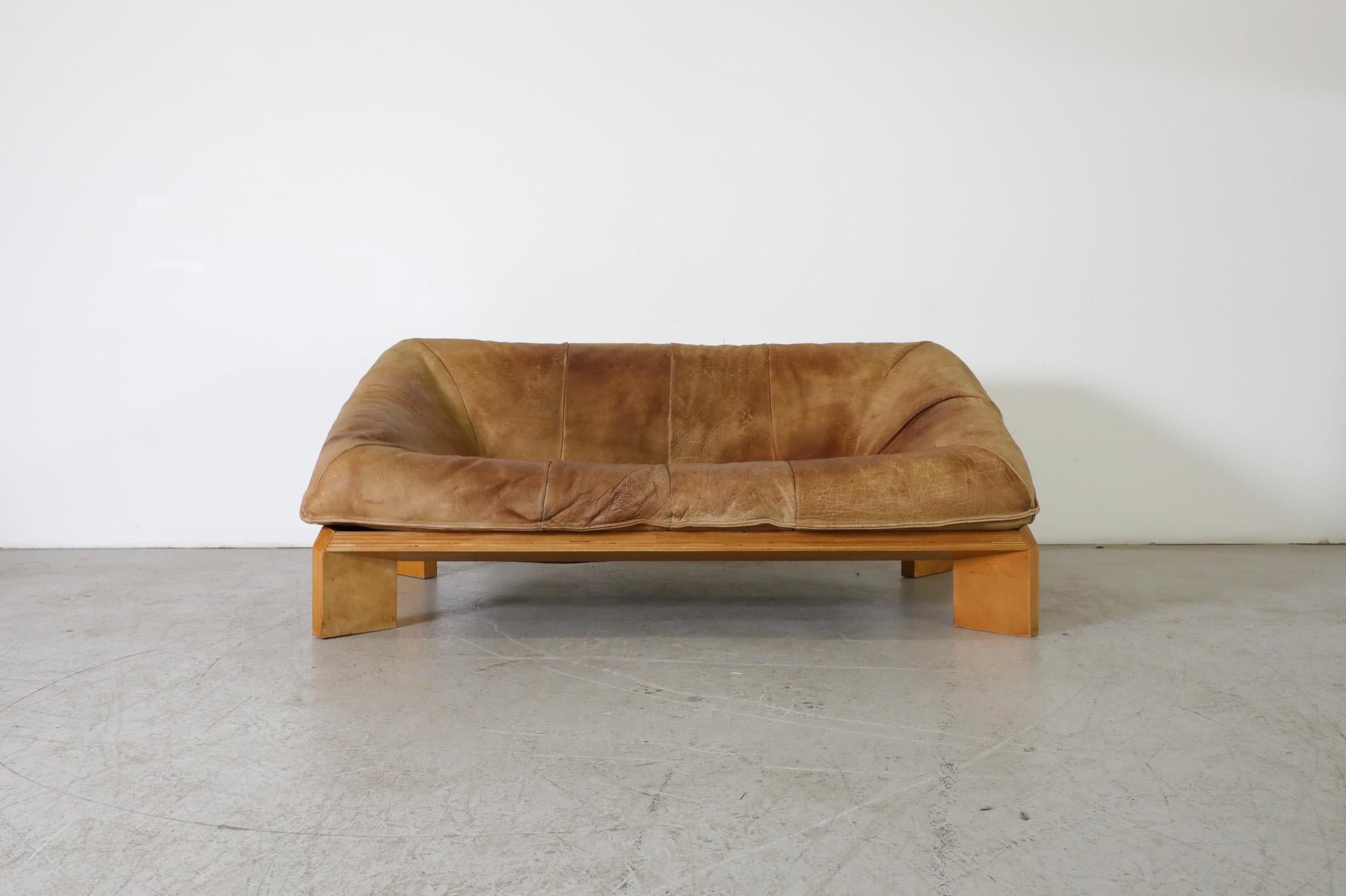 This Mid-Century, 'Oslo' sofa was designed by innovative and prolific Dutch designer Gerard van den Berg for the Montis company, the iconic furniture manufacturer of which Van den Berg was the co-founder and owner.. This wonderfully designed piece