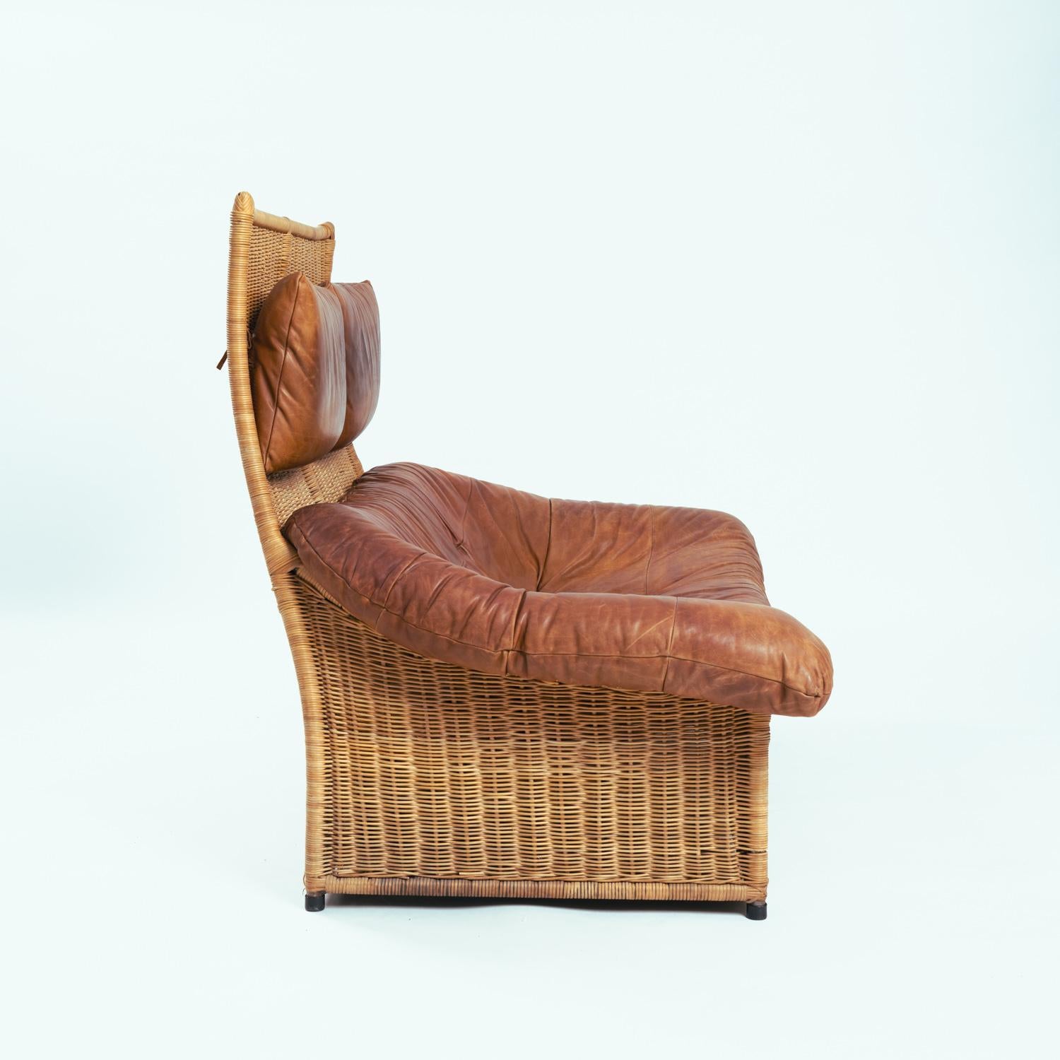 This rare and very comfortable mid-century 'Rock' style sofa was designed in the style of the famous Rock by the famous Dutch designer Gerard van den Berg for Montis. 
The Netherlands, 1970s
It is a beautiful loveseat with buck leather seating and