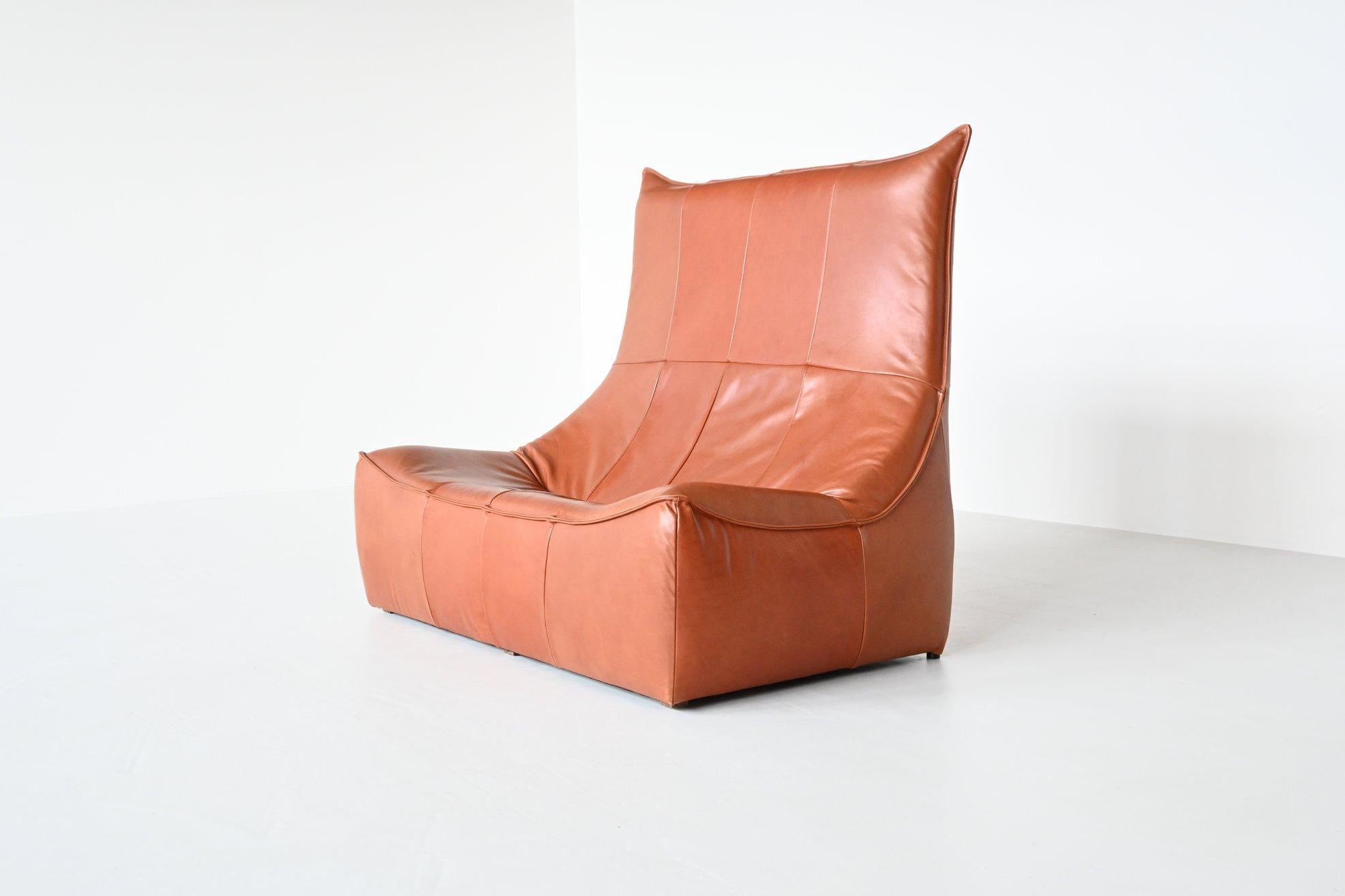 Amazing and very comfortable lounge sofa model Rock or Florence designed by Gerard van den Berg and manufactured by Montis, The Netherlands 1970. This fully leather covered two-seat sofa was one of the most successful designs from Gerard van den