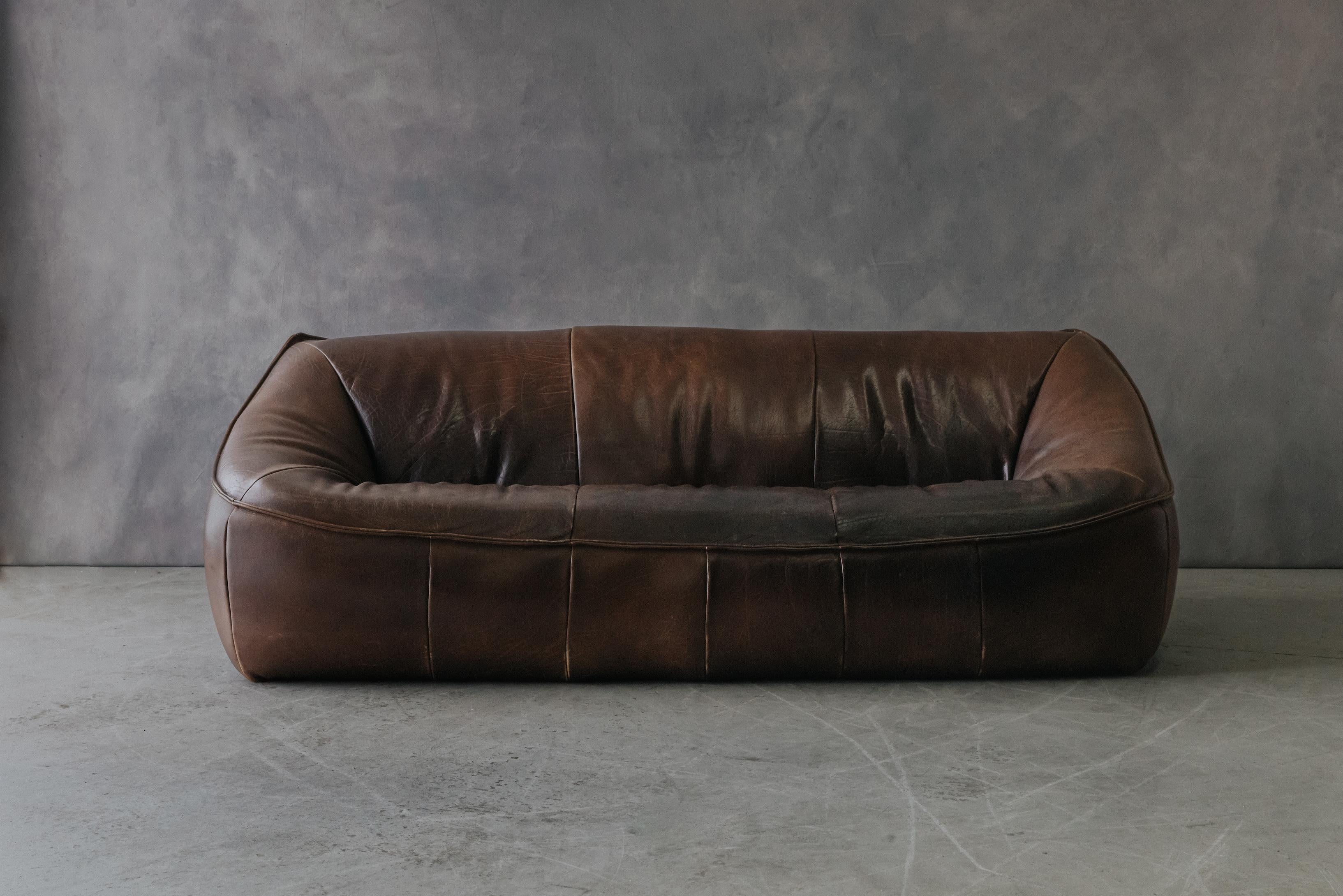 Gerard Van Den Berg Sofa 'Ringo', for Montis, The Netherlands, 1970s.  Wooden construction, covered with thick patinated leather.  Very comfortable model with superb original patina and use.