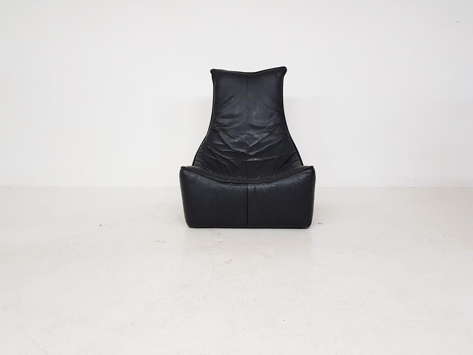 Black leather Brutalist lounge chair by Dutch designer Gerard Van Den Berg for Montis, the Netherlands 1970s.

This is one of the most iconic lounge chairs of the Dutch late midcentury. Gerard Van Den Berg designed his 