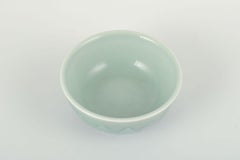 Gerd Bøgelund for Royal Copenhagen. Celadon-glazed bowl with relief decoration.