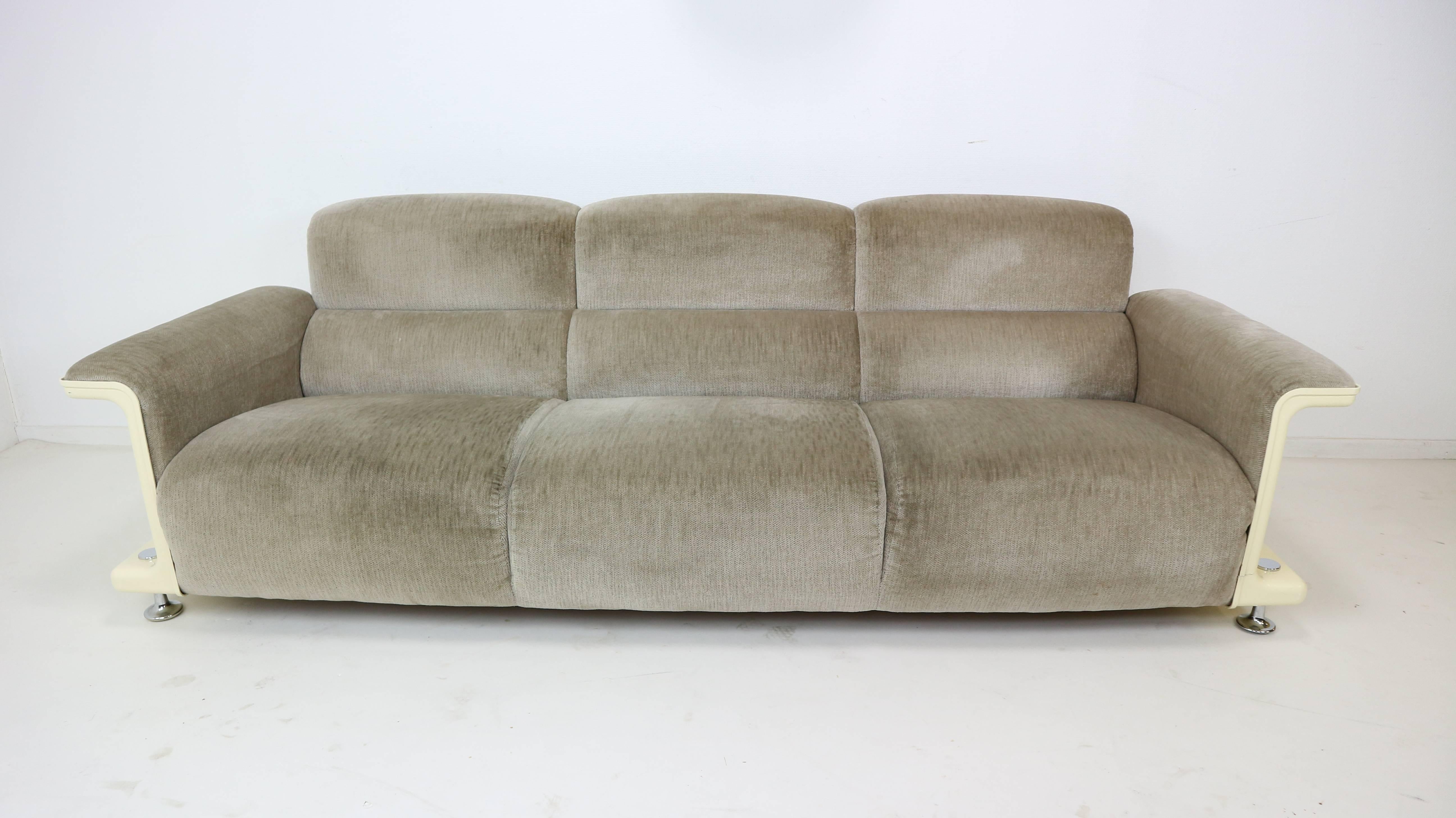Beautifully designed three-seat sofa from the 1970s, made in the Netherlands. The shell is made from a hot-pressed sheet molding compound and its covered with a light grey velvet upholstery. 



     