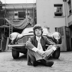 Mick Jagger and his Aston Martin DB6, London 1966 by Gered Mankowitz