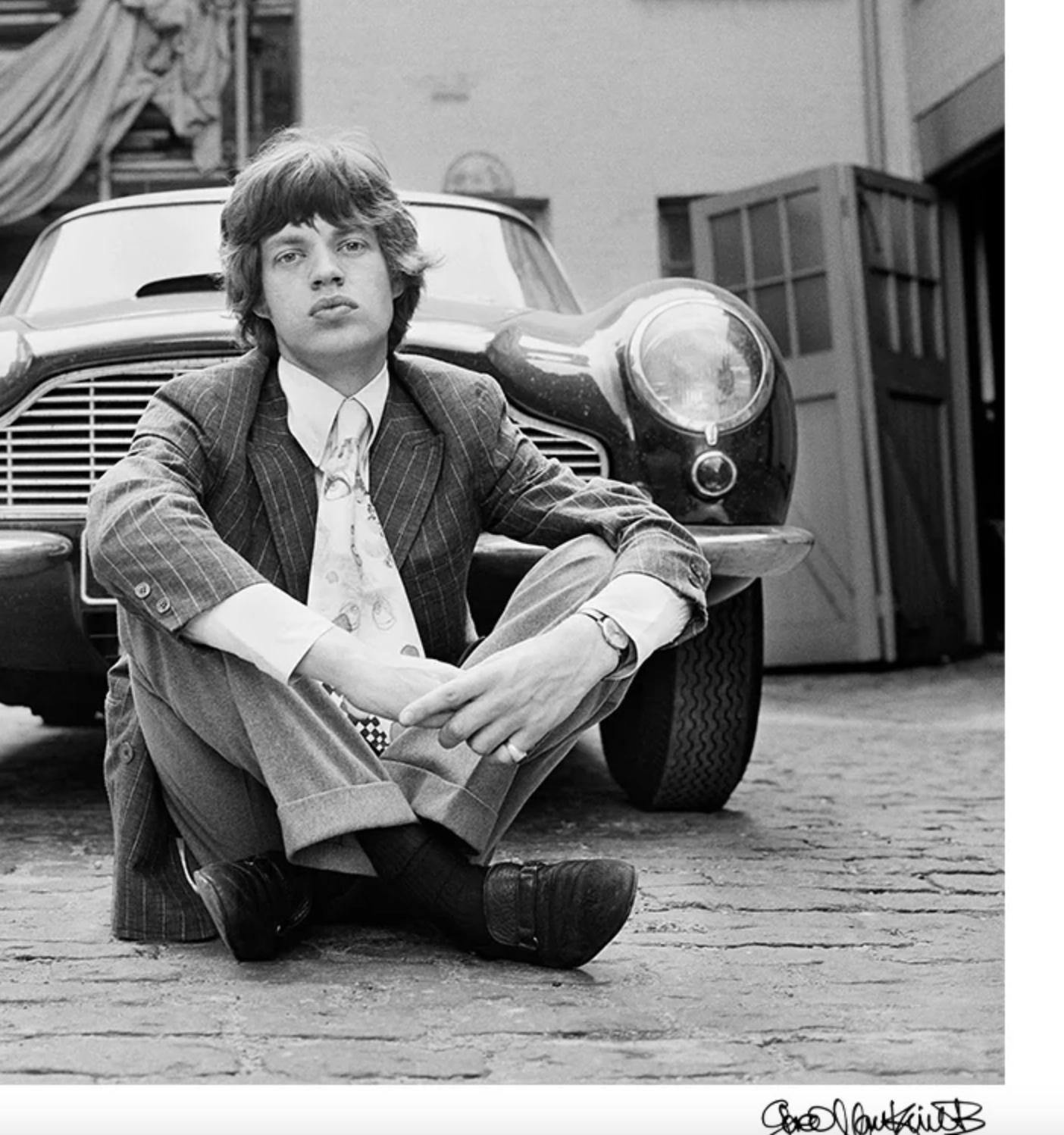 Mick Jagger with his Aston Martin DB6, 1966 — Signed Limited Edition Print - Modern Photograph by Gered Mankowitz