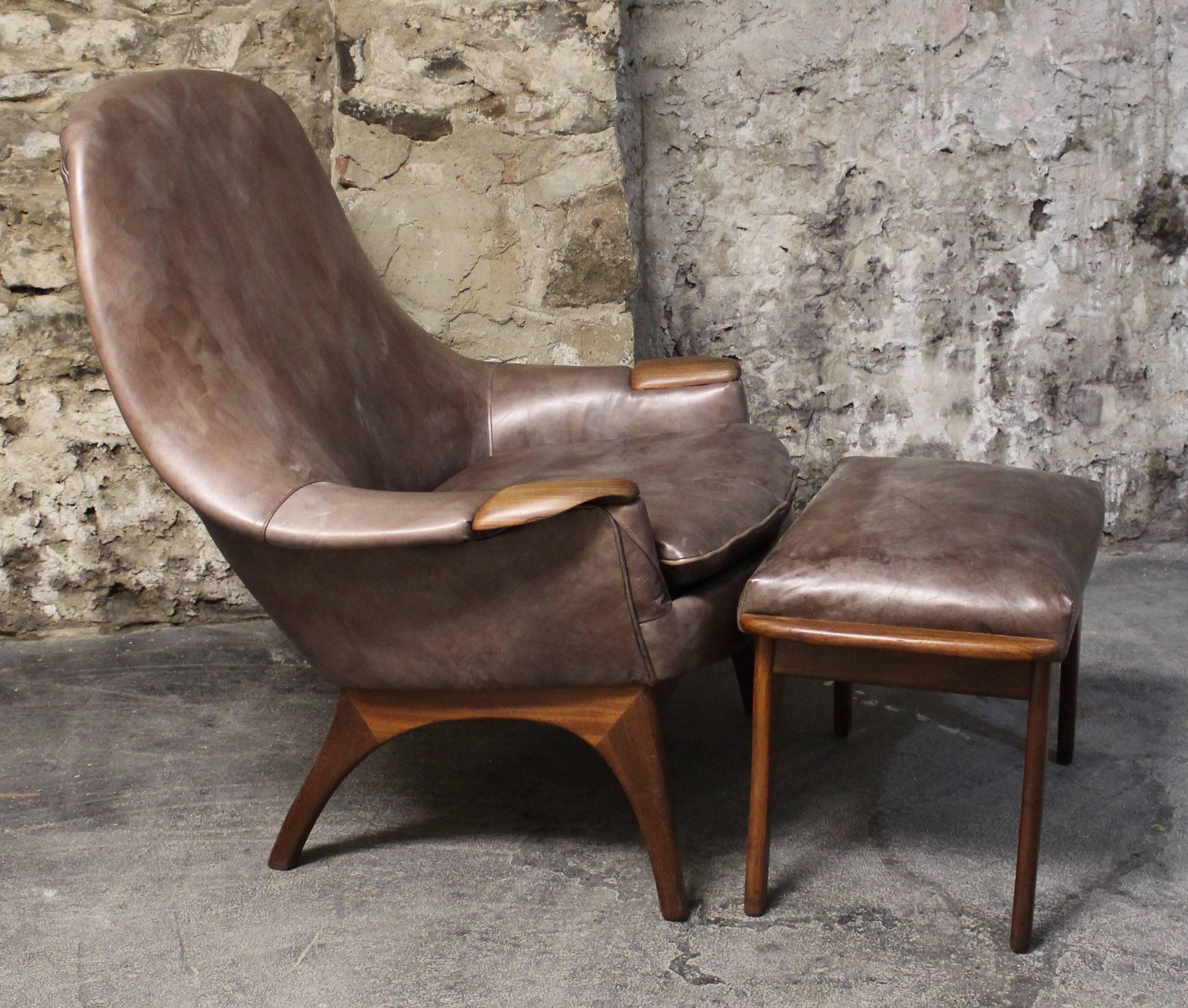 Stunning Norwegian lounge chair and matching ottoman designed by Gerhard Berg for LK Hjelle. They feature teak frame and has been newly upholstered in leather.

Scandinavian Modern / Mid-Century Modern.
 