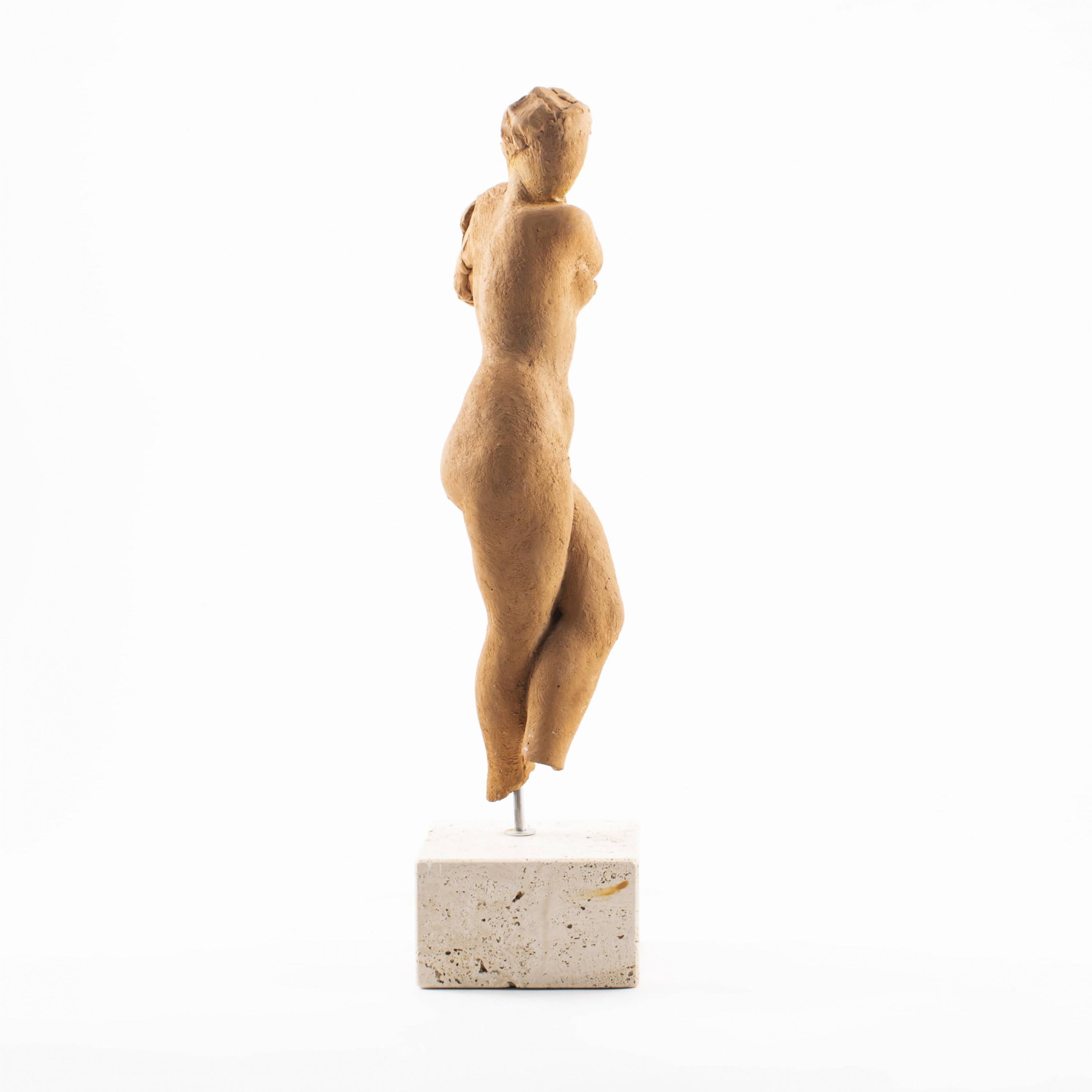 clay female torso sculpture