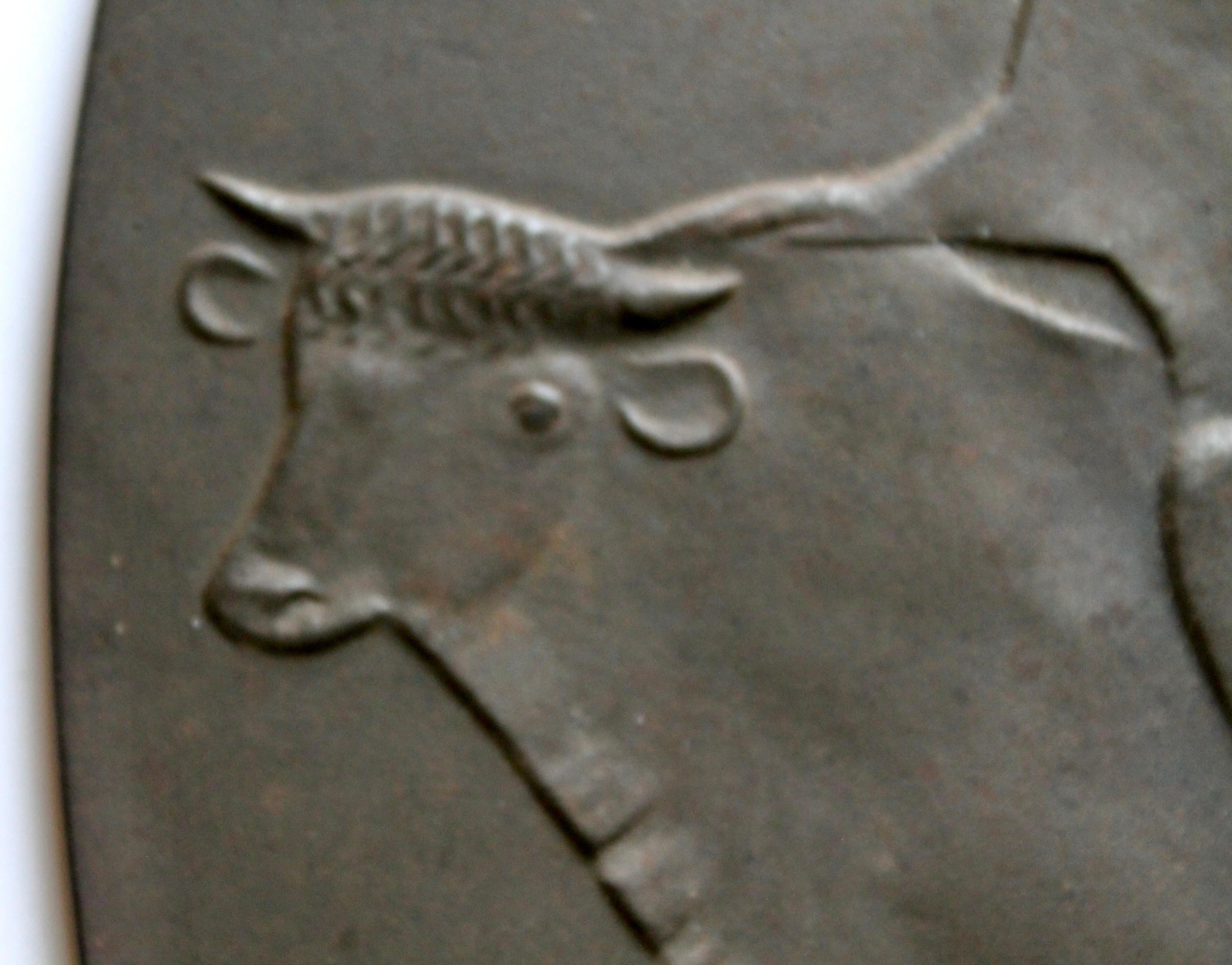 Targa in ghisa 