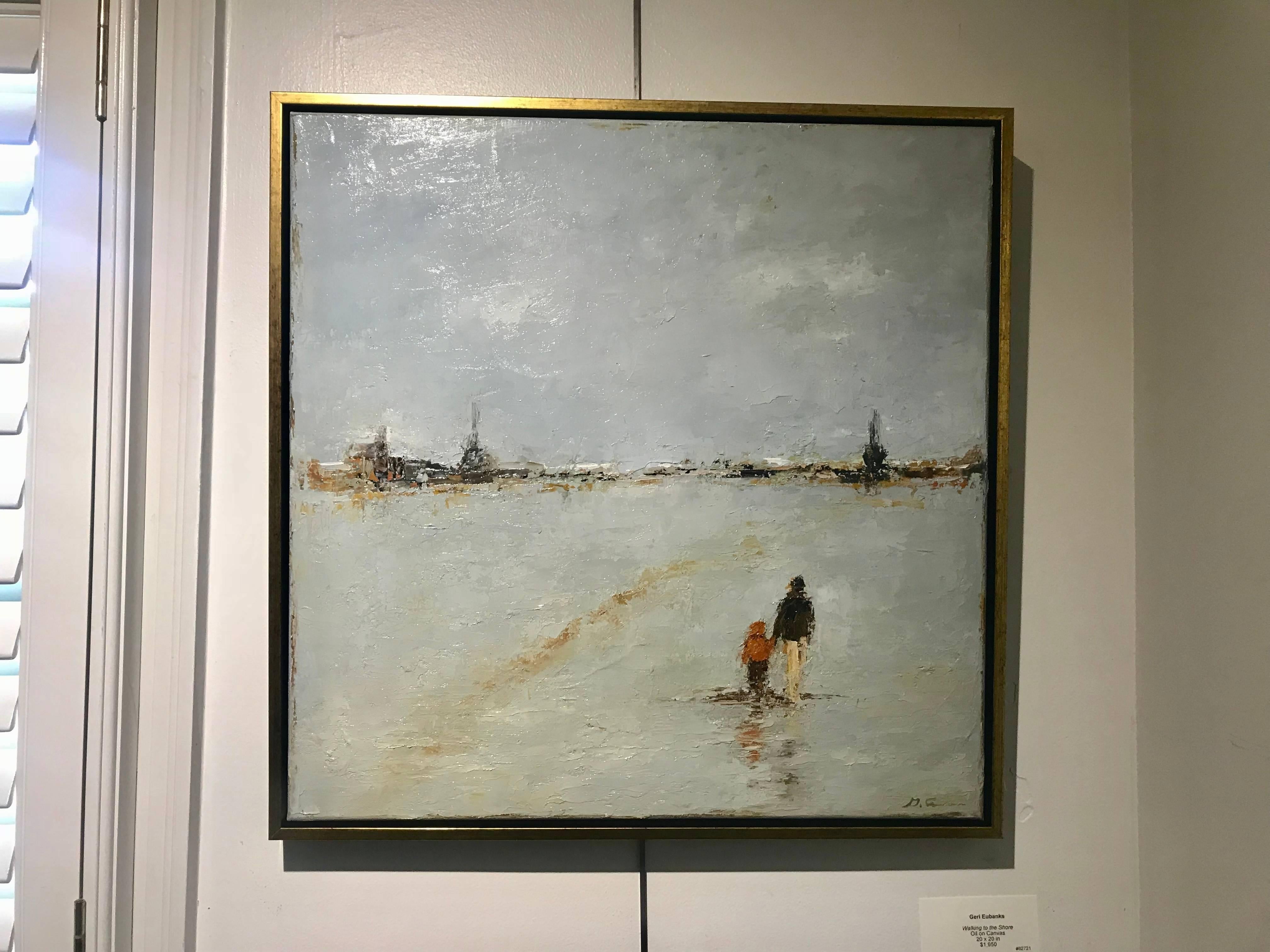 'Walking to the Shore' is a framed square format Impressionist oil on canvas painting created by American artist Geri Eubanks in 2018. Two characters, an adult and a child, are walking along a shore. The child's hood, along with the grey sky,