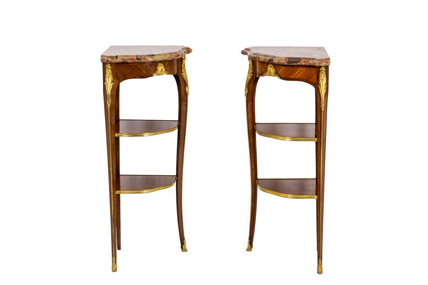 Germain-Maximilien Durand, stamp. 

Pair of rosewood-veneered corner consoles, stamped under the molded Aleppo breccia marble. Veneer in curling wood, rosewood and violet wood. Curved feet joined by two crotch shelves. Gilt bronze trim adorned