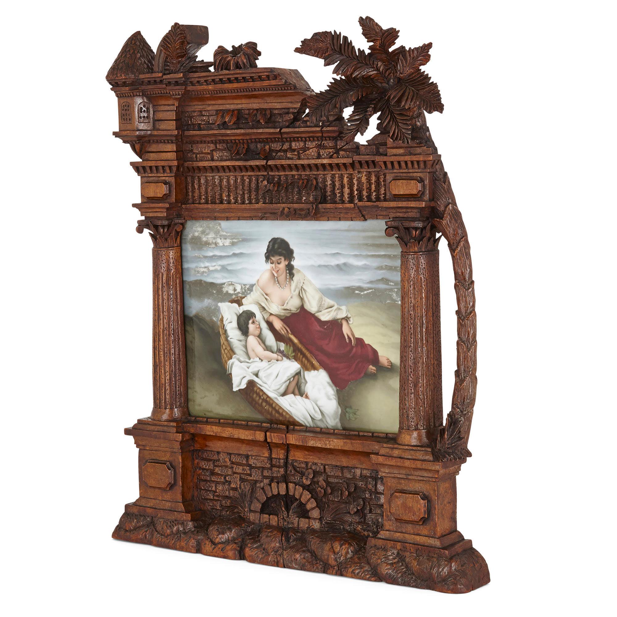 Placa de porcelana Germain en un marco ornamentado tallado de la Black Forest
Alemán, siglo XIX
Medidas: Marco: Alto 58 cm, ancho 46 cm, fondo 6 cm
Placa: Altura 23 cm, anchura 30 cm, profundidad 0,5 cm

Este maravilloso artículo se compone de