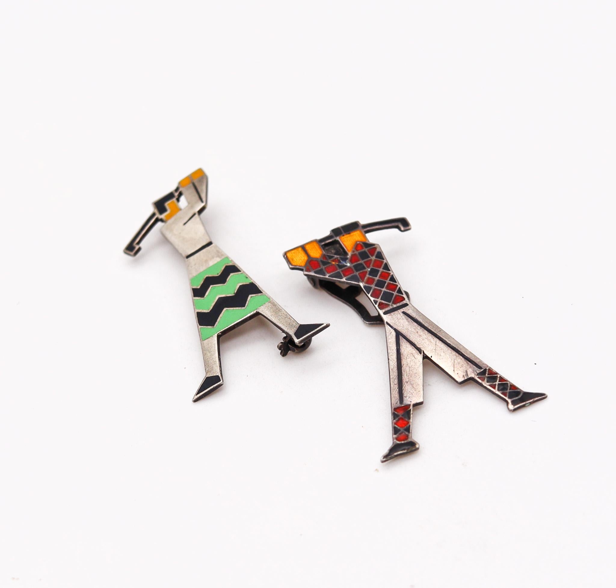 Art Deco golf players brooches.

Beautiful and very stylish couple of golf players, created in Germany during the art deco period, back in the 1925. This pair of pin brooches has been crafted with geometric patterns in solid .925/.999 sterling