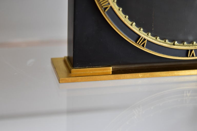 Table clock Design by Heinrich Möller in 1930's. Black painted wood with brass handle and roman sign. Mechanical movement is working, some cracks in the paint.


 