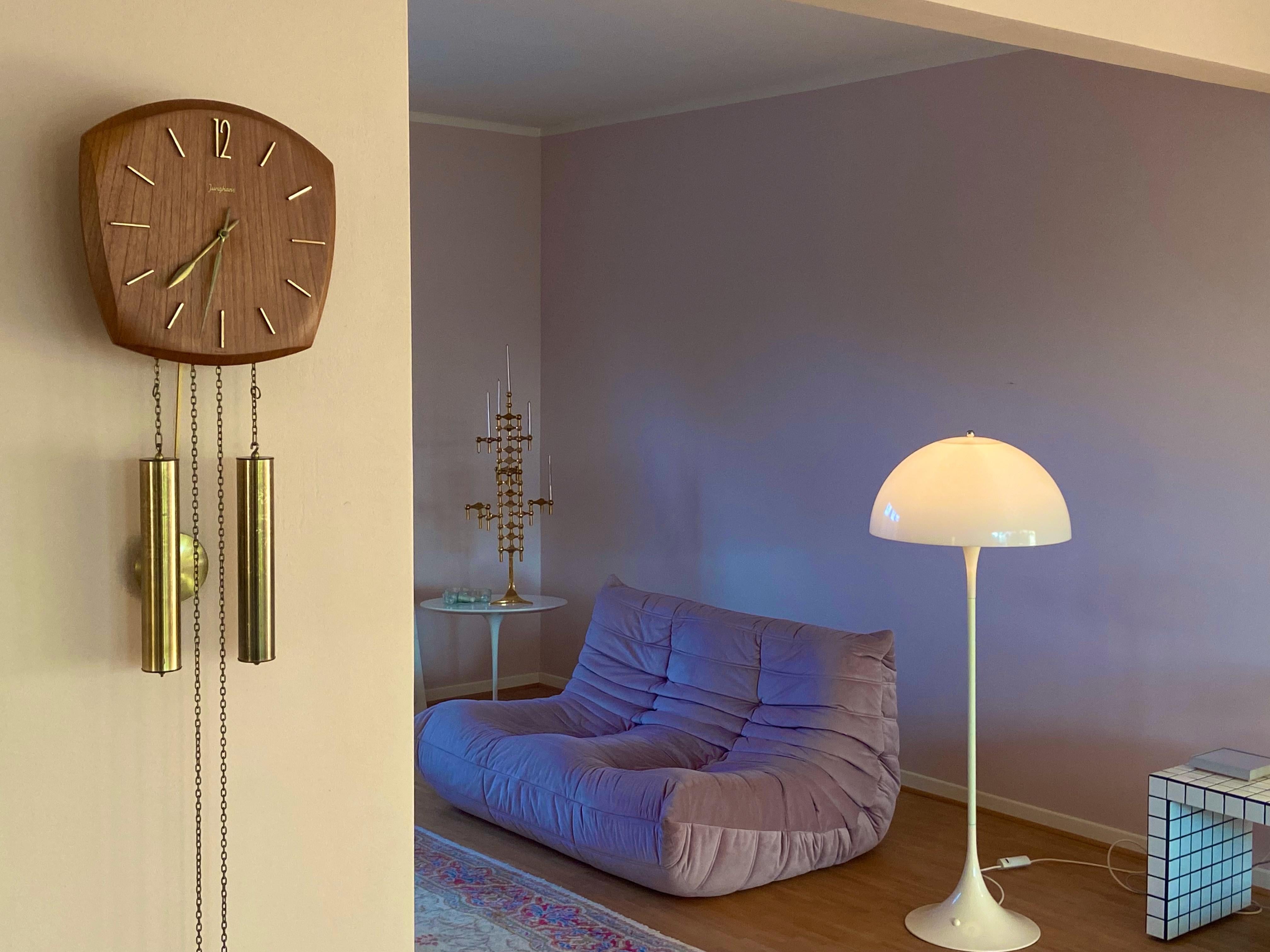 Wall clock Design & produced by Junghans in 1960s. Brass metal and Teak wood. Mechanical movement and gong is in good working condition. Very nice gong but if you don't like it is possible to stopp the gong function. No damages and nice vintage