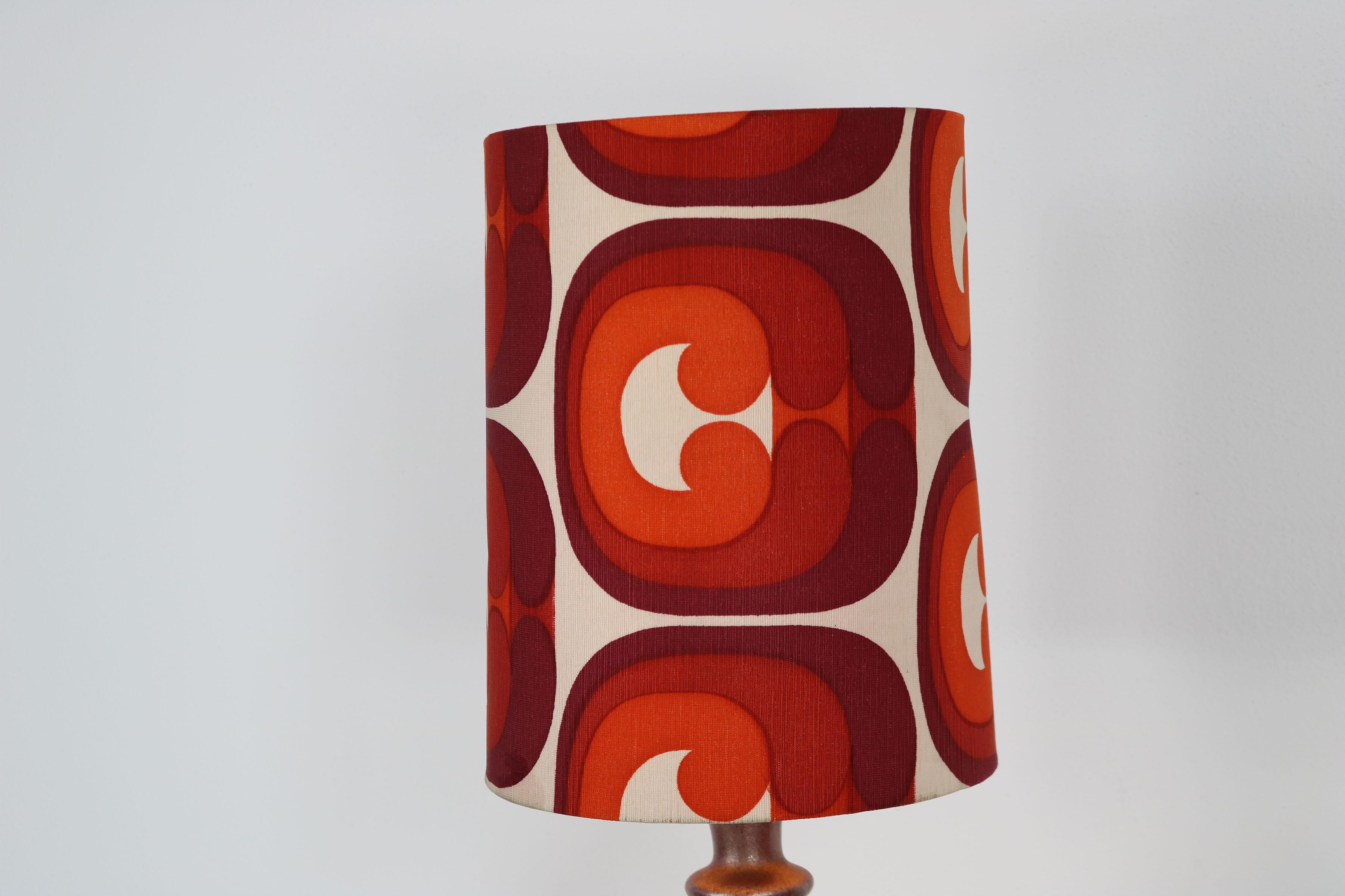 Late 20th Century German 1970s ceramic table lamp with a spacy fabric shade For Sale