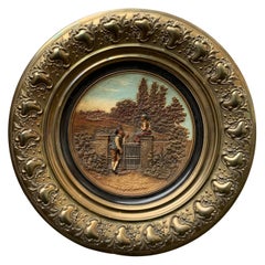 Plato de pared alemán del siglo XIX de latón y loza