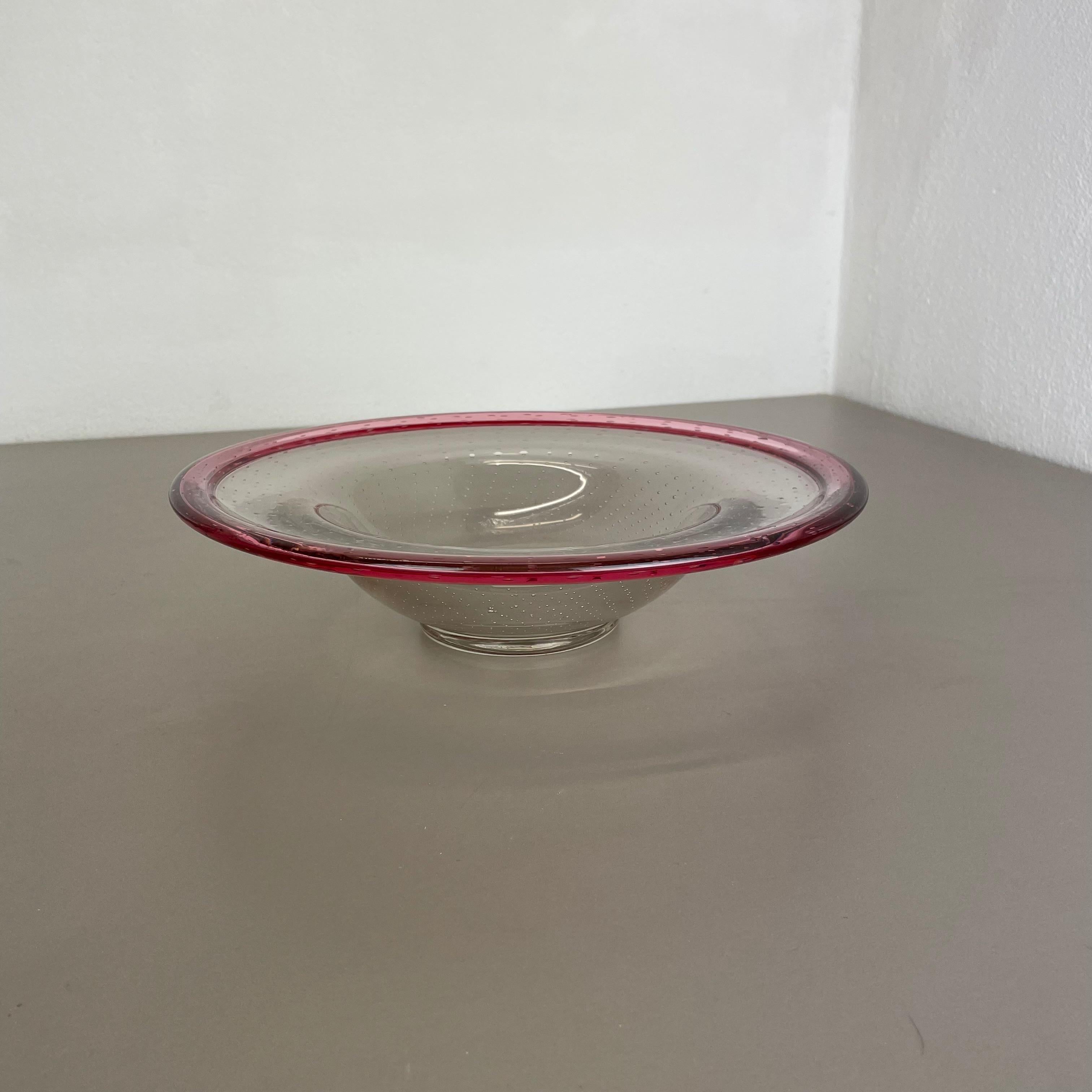 Article: Glass bowl



Producer: WMF, Germany 



Designer: Karl Wiedmann 


Design 1930s, this item was produced in the 1960s.



Description: 

Wonderful heavy Art Deco glass element designed by Karl Wiedmann and produced WMF,