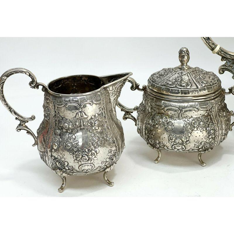 German 800 silver repousse tea set rose Garlands & Acorn Finials, circa 1900

German 800 marks to the underside.

Additional Information:
Material: Silver 
Pattern: Repousse
Type: Tea Set
Weight Approx., 77 ozt
Dimension: Creamer: 5.5