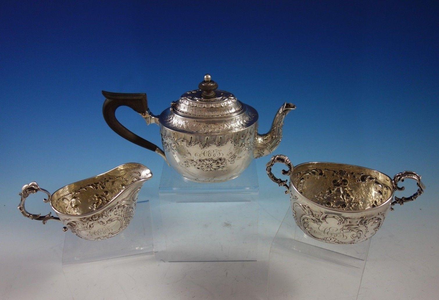 Exceptional German .800 silver tea set of 3-piece with Hanau pseudo hallmarks. The set has repoussed figural cupids and flowers. This set includes:
1 - Tea pot: Measures: 9 1/4