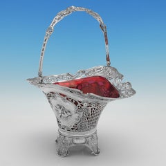 Victorian Elegance: Ornate Silver Basket with Striking Ruby Glass Liner c.1890