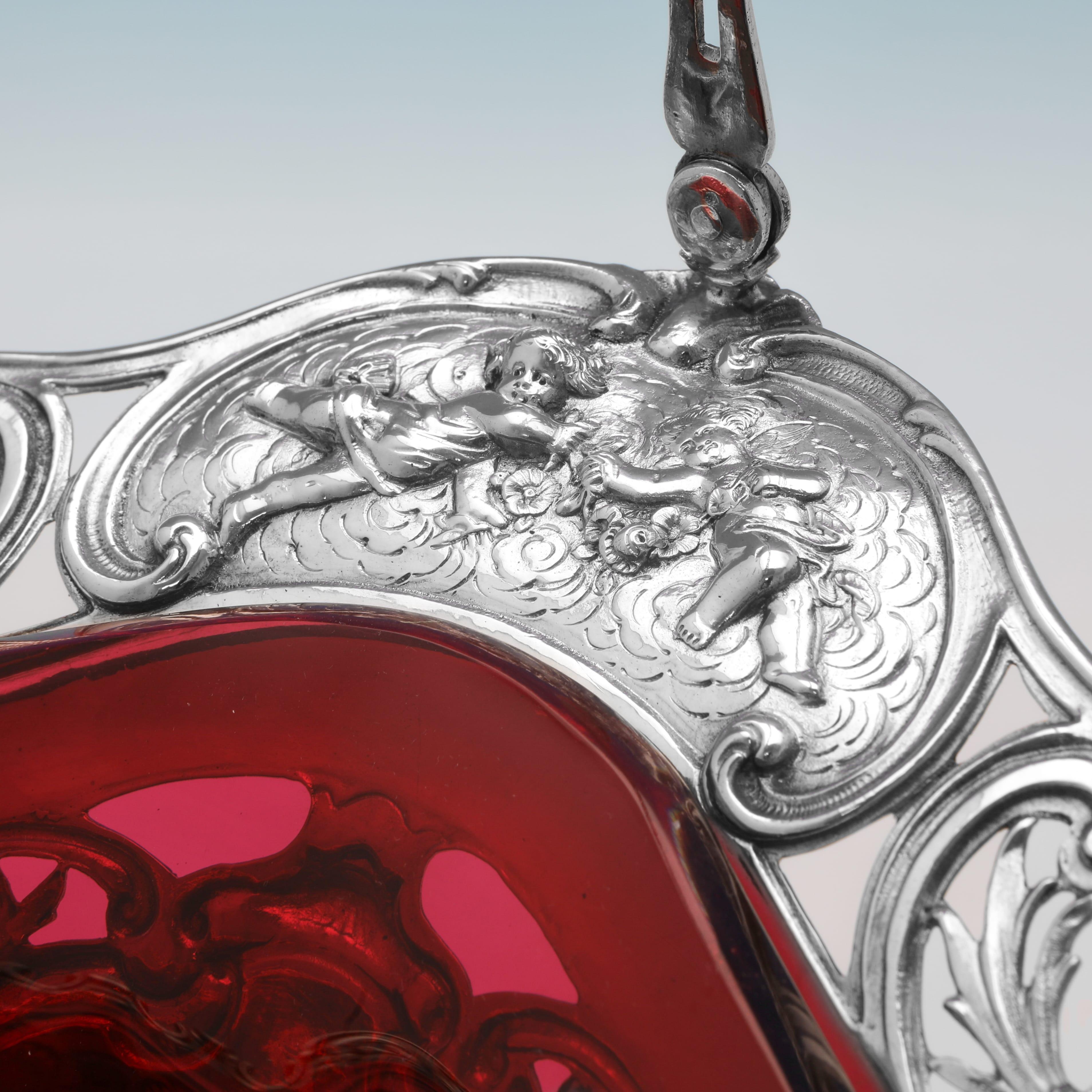 Victorian Elegance: Ornate Silver Basket with Striking Ruby Glass Liner c.1890 In Good Condition For Sale In London, London