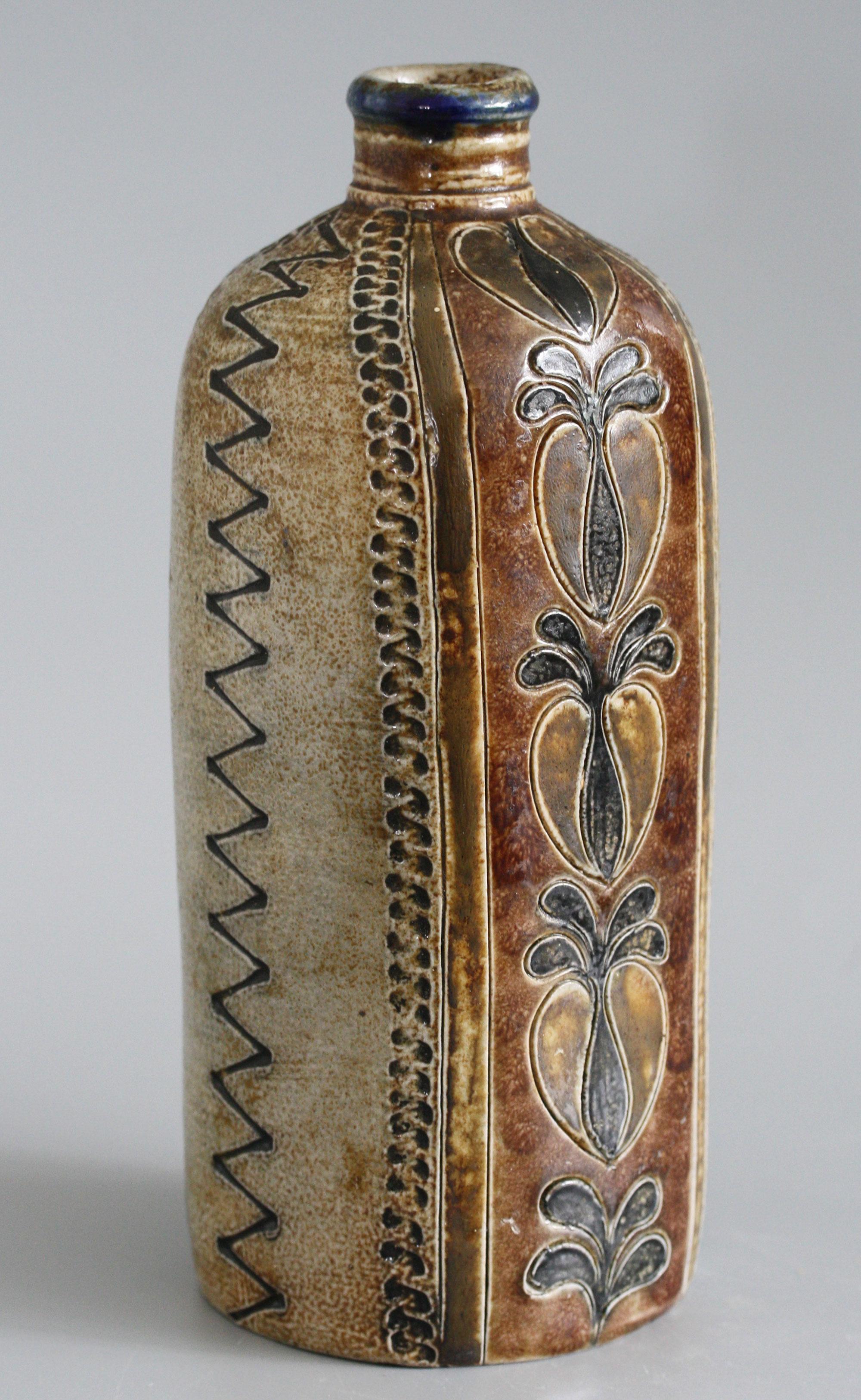 Late 19th Century German Antique Handmade Salt Glazed Fruit Patterned Stoneware Bottle For Sale