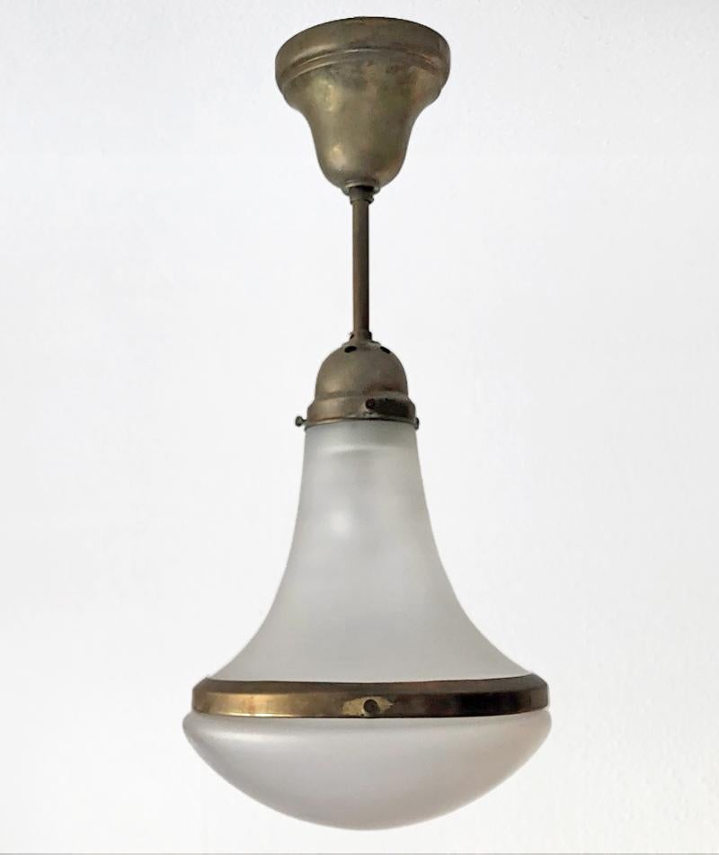 Beautiful Art Deco matte glass and brass pendant light.
Germany, 1910
Lamp sockets: 1 E27 (US E26).
Height of body: 35 cm