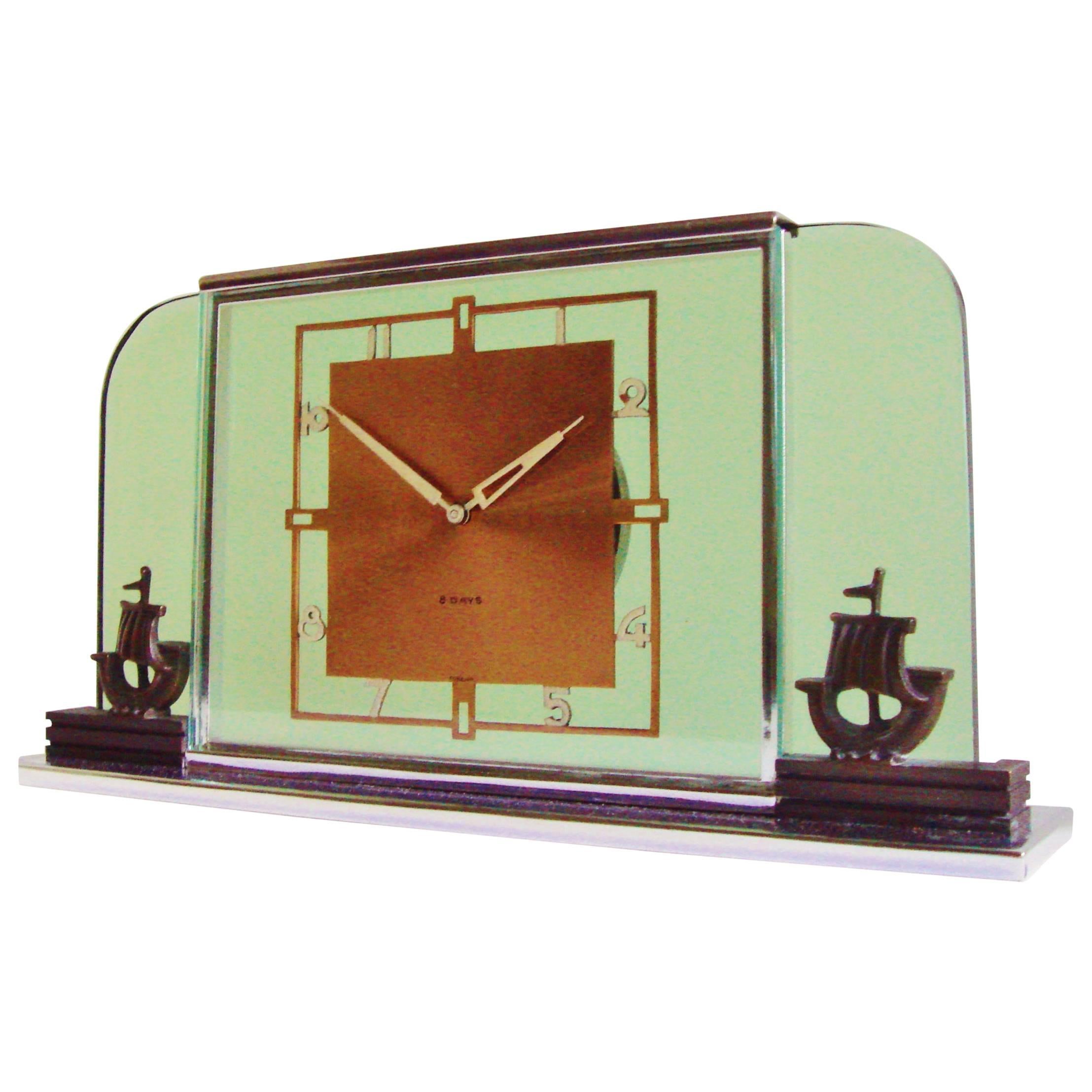 German Art Deco Glass, Chrome, Copper and Bronze Figural Mechanical Desk Clock