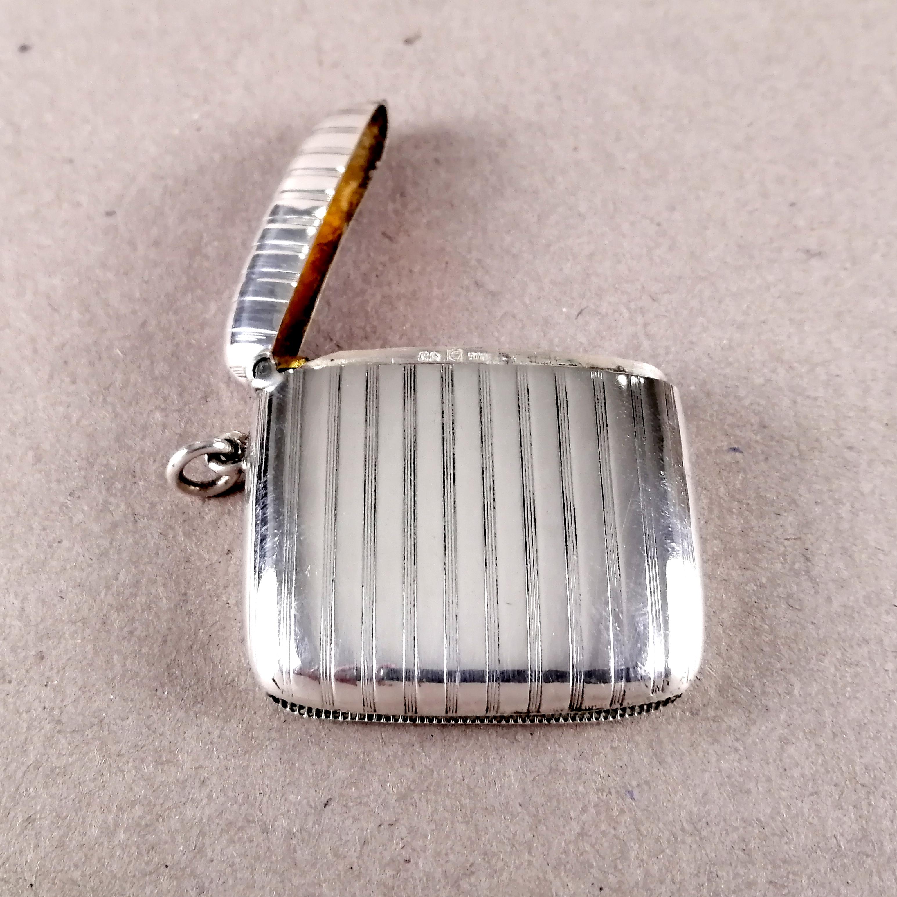 An elegant ca. 1920 Art Deco set of cigarette box and match case in .900 silver by German silversmith Louis Kuppenheim (active 1900 - 1940). The curved design shows ribbed lines. The box's interior shows gilded interior. Sealed 