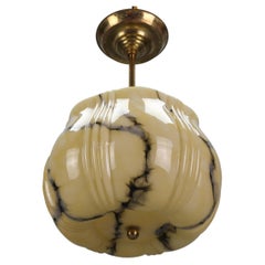 German Art Deco Marbled Amber Color Glass and Brass Pendant Light