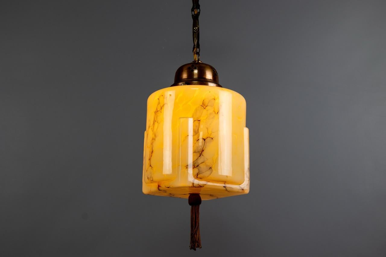 Mid-20th Century German Art Deco Marbled Amber Color Glass and Copper Pendant Light, 1930s For Sale