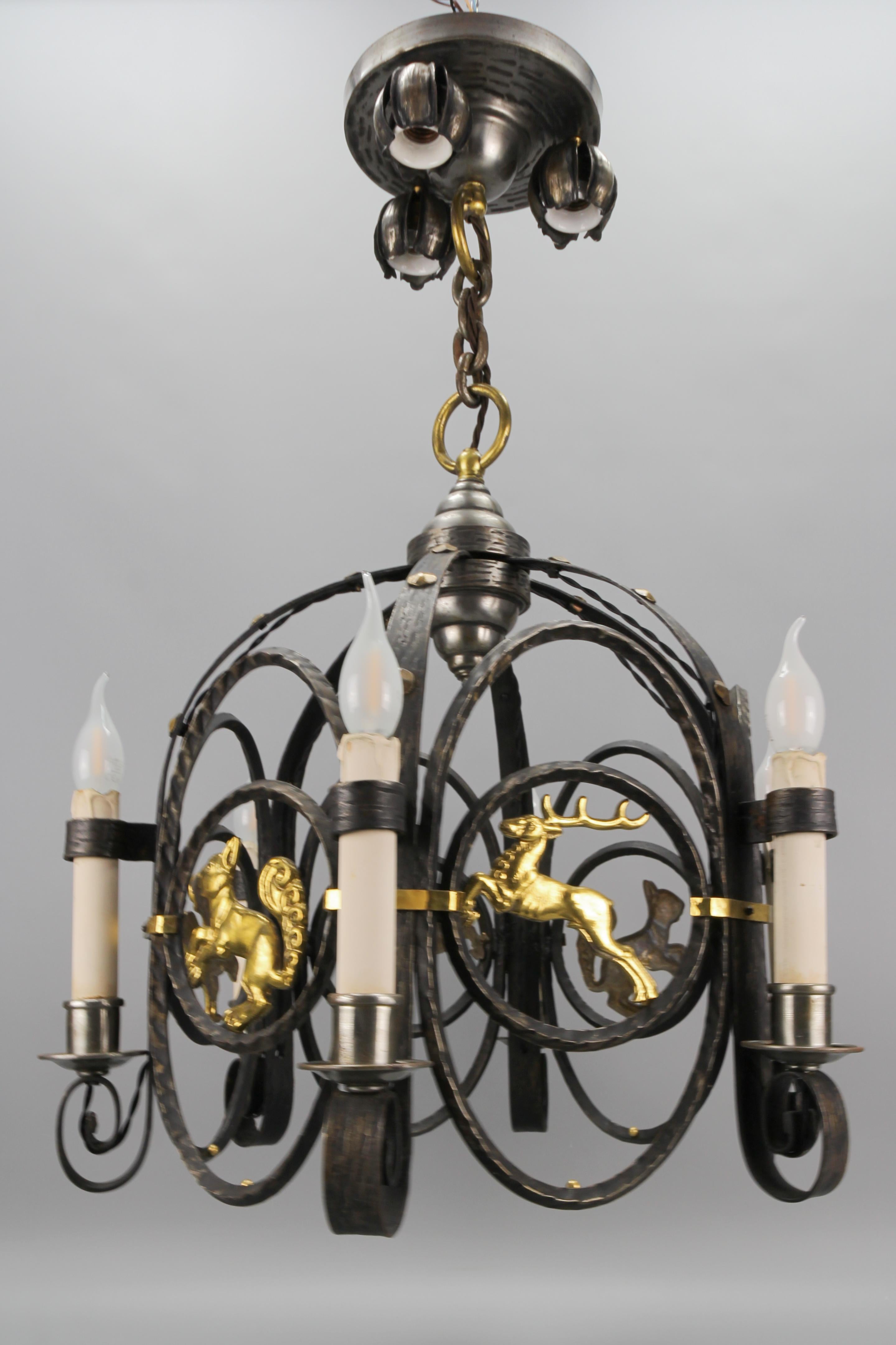 German Art Deco Nine-Light Wrought Iron and Brass Chandelier with Animals, 1920s For Sale 3