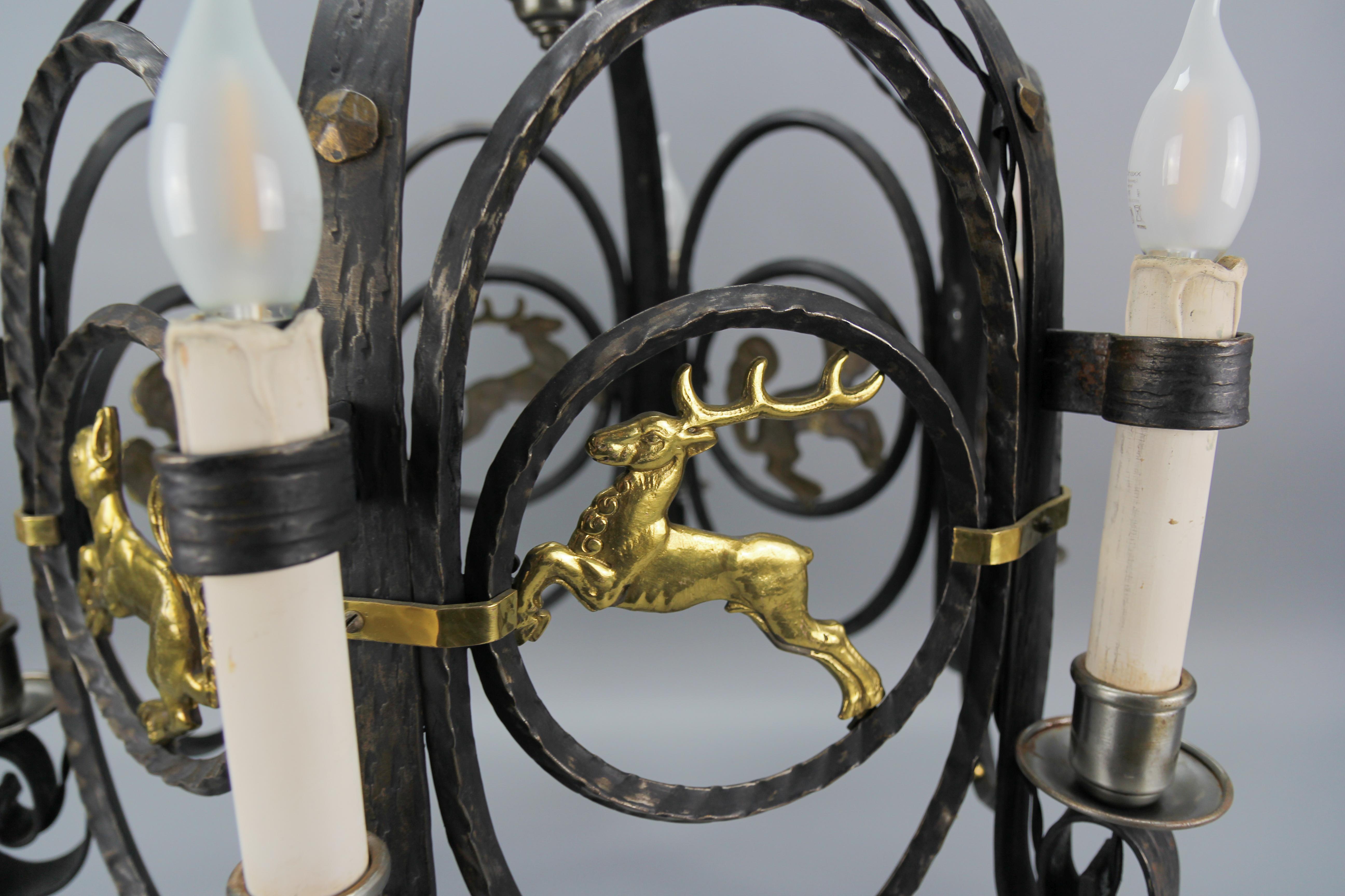 German Art Deco Nine-Light Wrought Iron and Brass Chandelier with Animals, 1920s For Sale 5