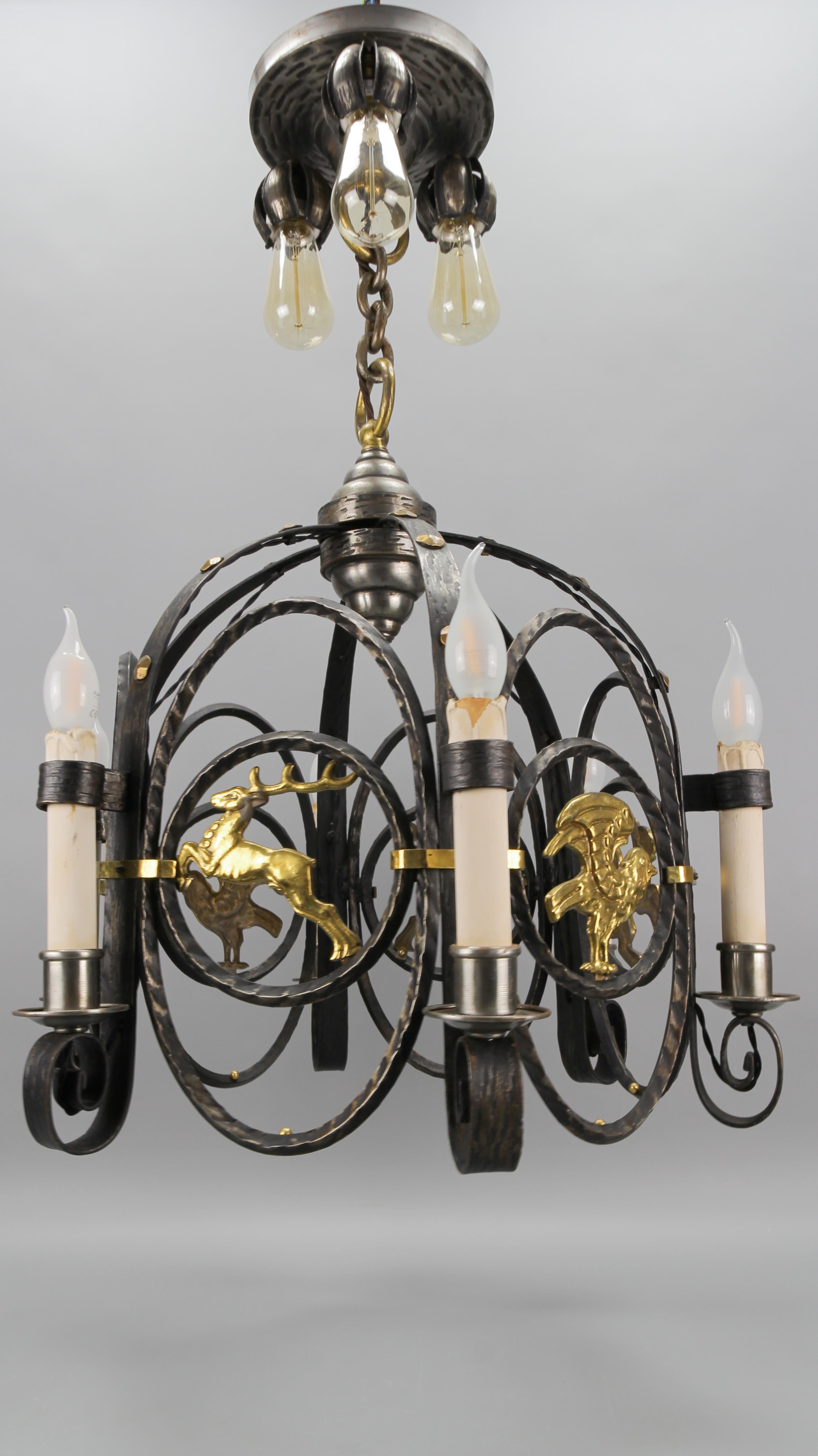 German Art Deco Nine-Light Wrought Iron and Brass Chandelier with Animals, 1920s For Sale 8