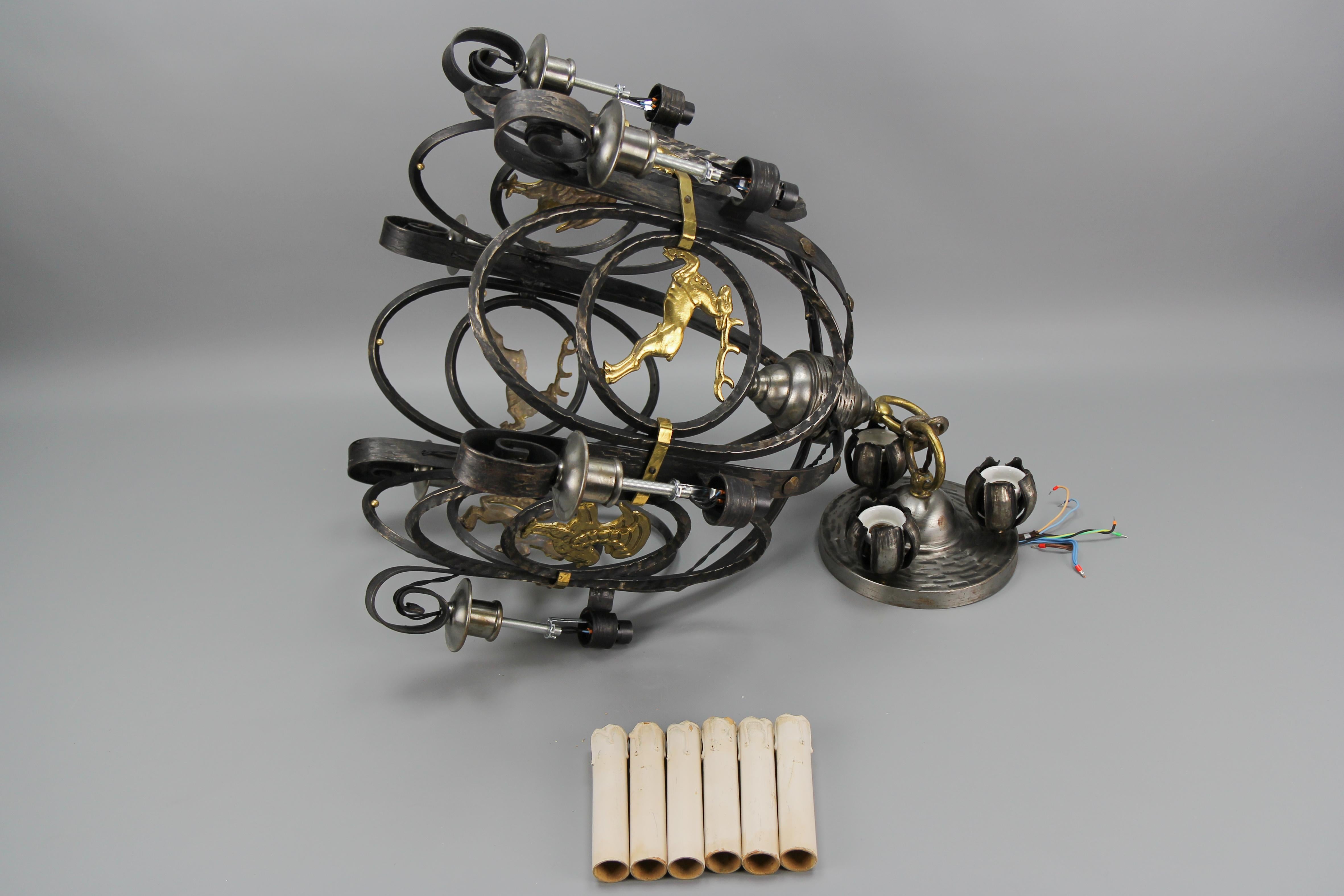 German Art Deco Nine-Light Wrought Iron and Brass Chandelier with Animals, 1920s For Sale 11