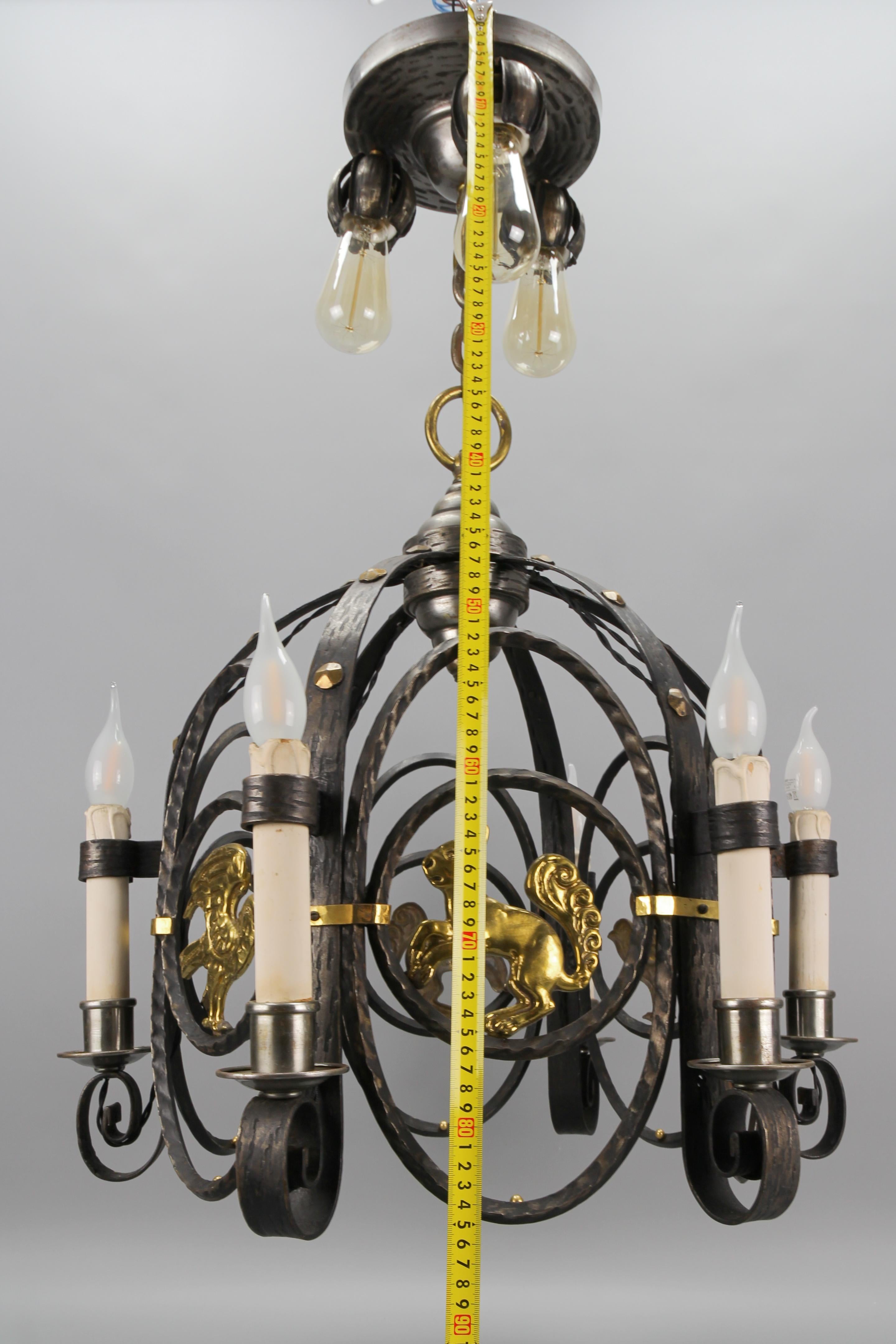 German Art Deco Nine-Light Wrought Iron and Brass Chandelier with Animals, 1920s For Sale 12