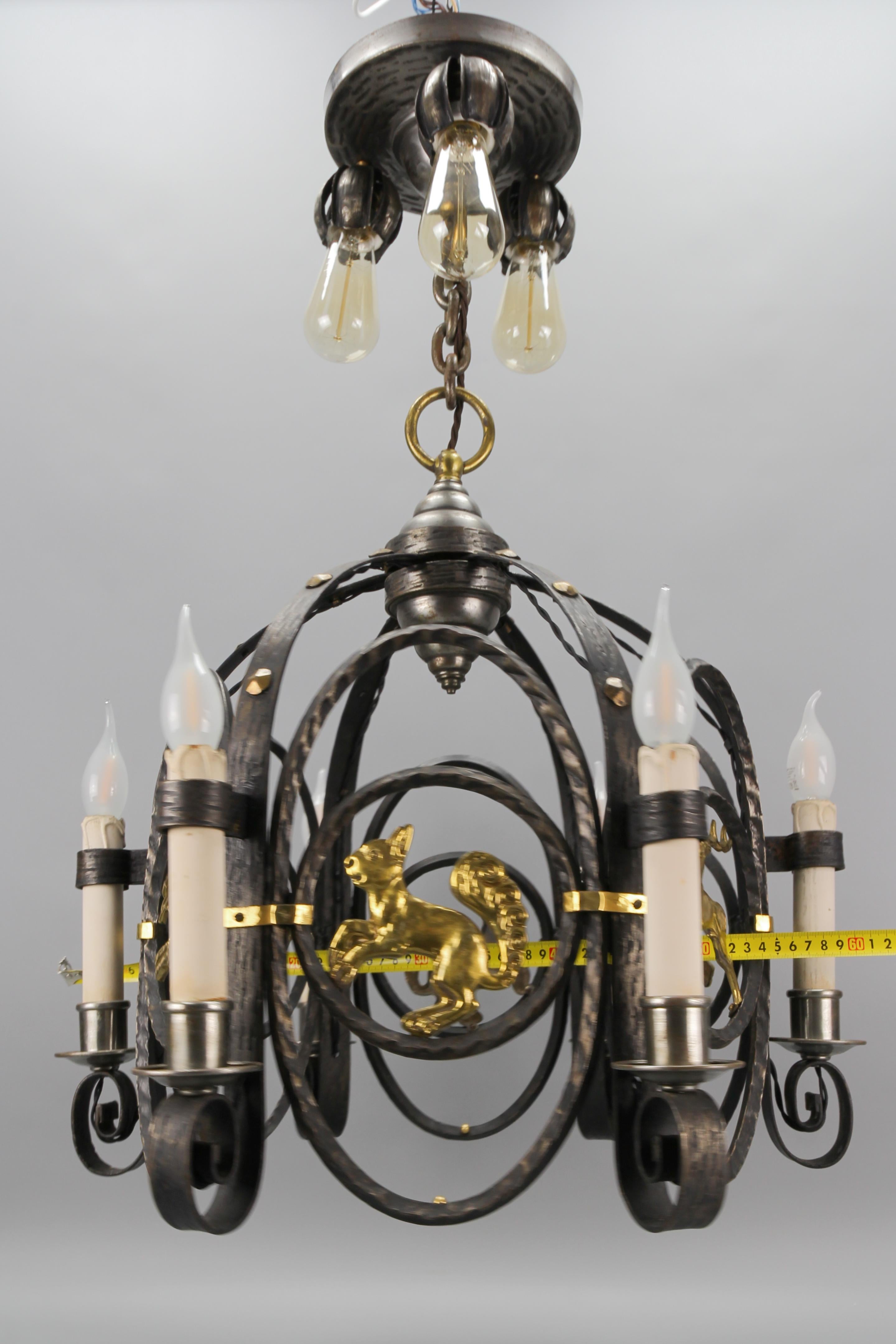 German Art Deco Nine-Light Wrought Iron and Brass Chandelier with Animals, 1920s For Sale 13