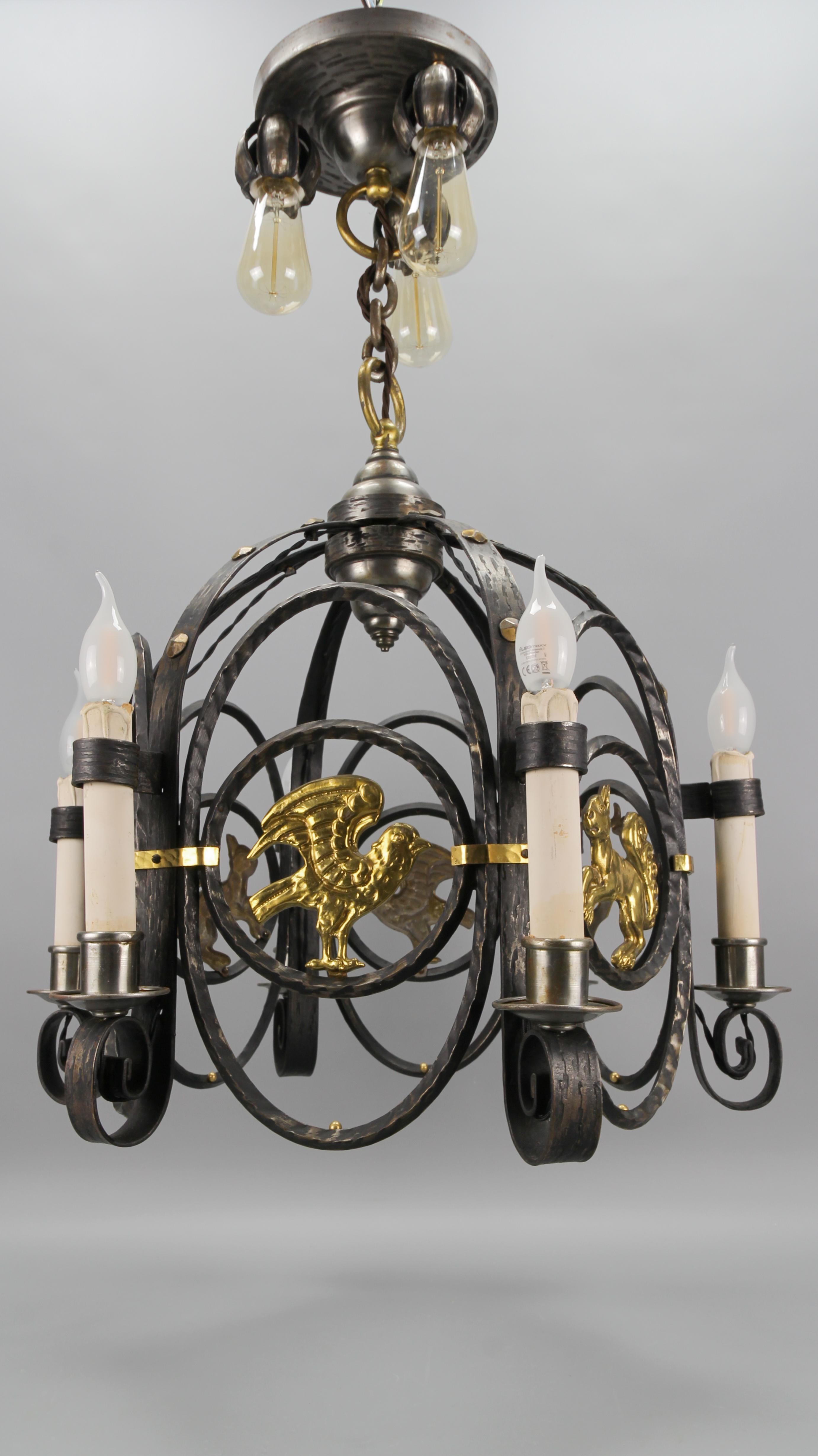 German Art Deco Nine-Light Wrought Iron and Brass Chandelier with Animals, 1920s For Sale 2