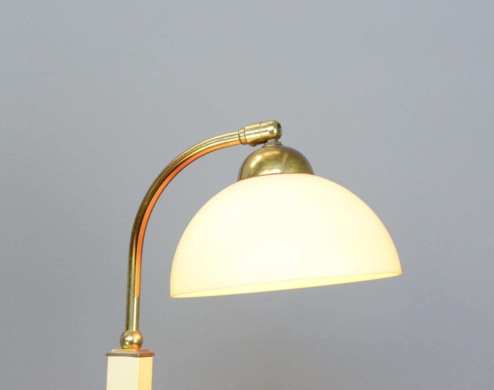 German Art Deco table lamp circa 1920s

- Brass with cream bakelite shade
- On/Off switch on the base
- Takes E27 fitting bulbs
- German ~ 1920s
- 42cm tall x 33cm deep x 20cm wide

Condition Report

Fully re wired with modern electrical