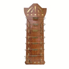 German Art Nouveau magazine rack in wood and bronze, with the days of the week.