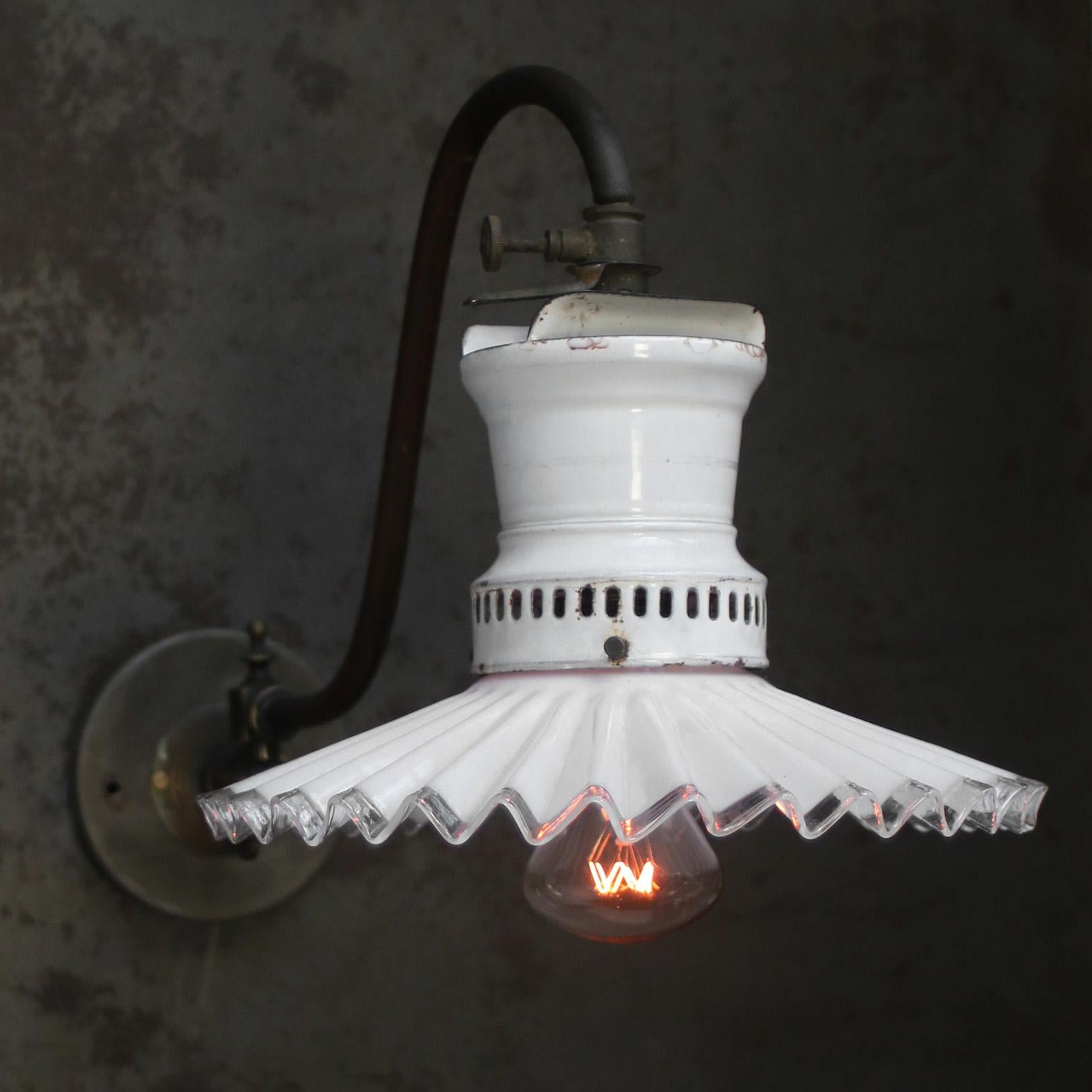 German sconce wall lamp / rewired gas lamp. ca 1910
White enamel top with white opaline glass shade
Brass arm

diameter brass wall mount: 12 cm / 4.7”

Weight: 1.20 kg / 2.6 lb

Priced per individual item. All lamps have been made suitable by