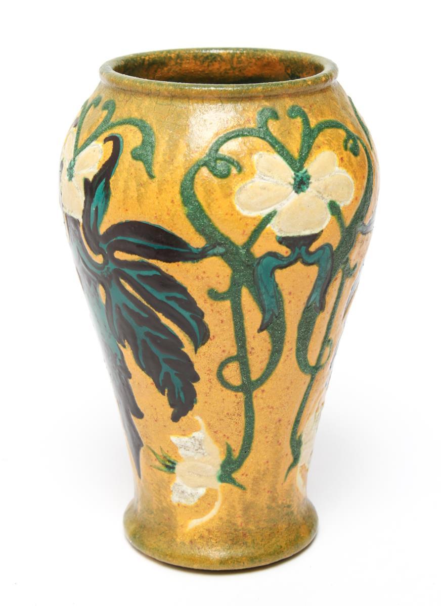 German Art Nouveau Royal Bonn Ruysdael pottery vase from circa 1900, incised with floral motif and leaves. The piece is glazed with multiple colors, the underside having hand inked marks 'Royal Bonn - 1814 - Ruysdael - D3 - Germany'. In good vintage