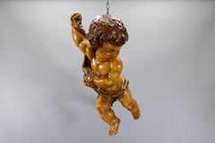 German Baroque Revival Style Polychromed Carved Wood Putto Figure