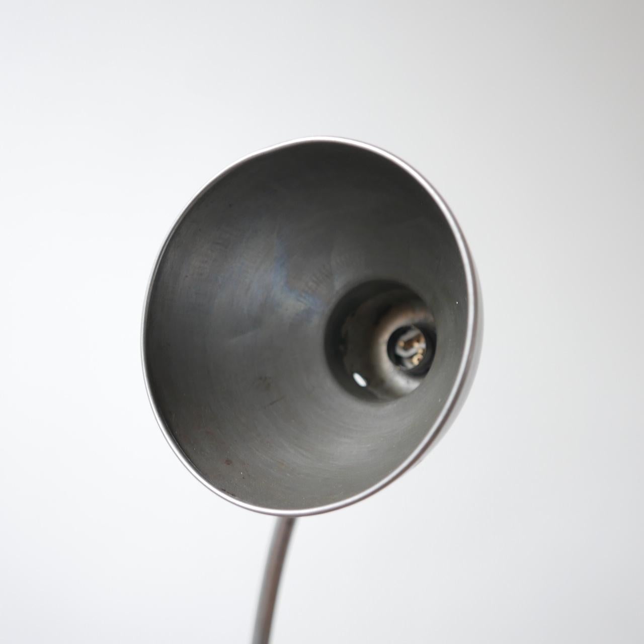 A Bauhaus era table lamp, likely by Kandem. 

German, circa 1930s. 

Polished, re-wired with black silk flex.
 