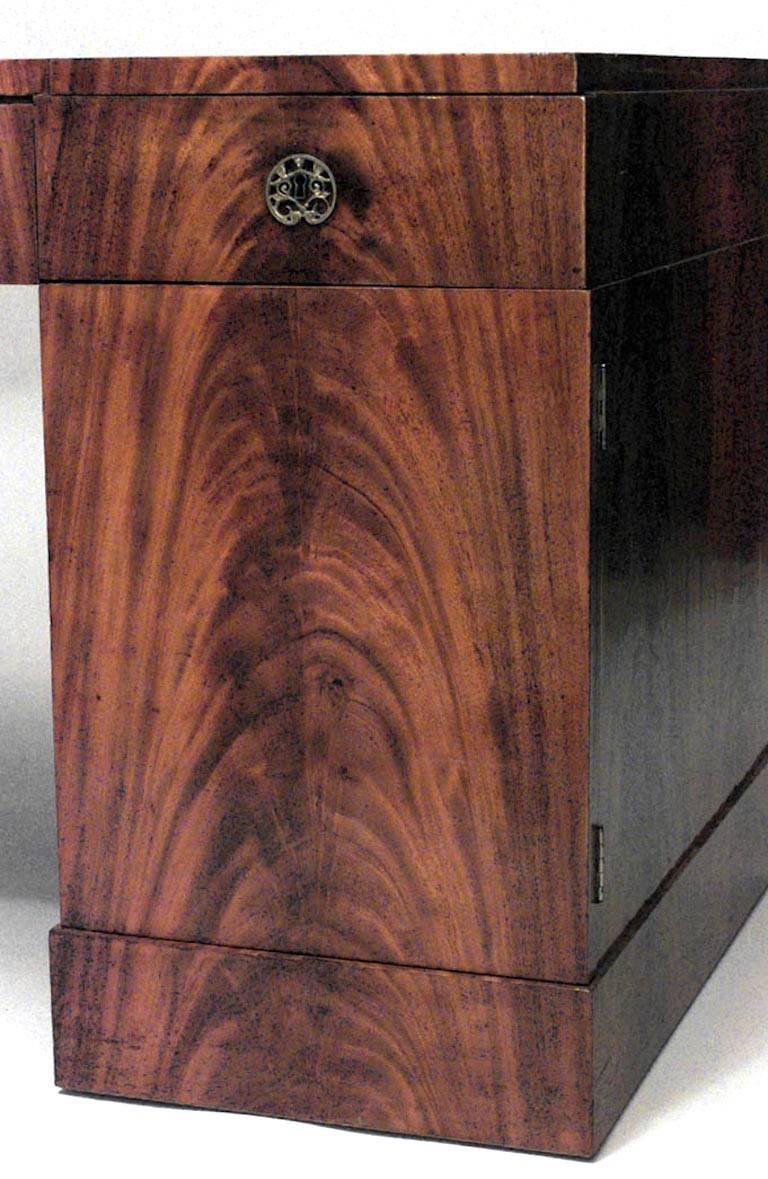 German Biedermeier (19th Century) mahogany kneehole desk with bronze trim.
