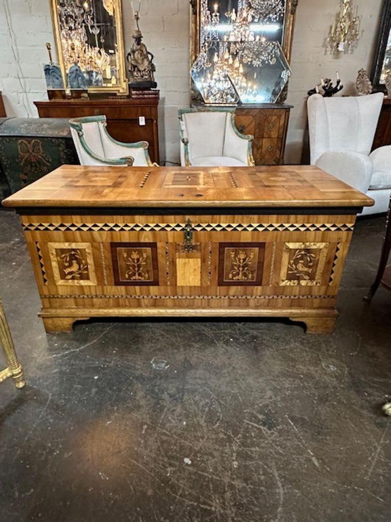 Exceptional 19th century German Biedermeier inlaid walnut trunk. Circa 1850. Adds warmth and charm to any room!
