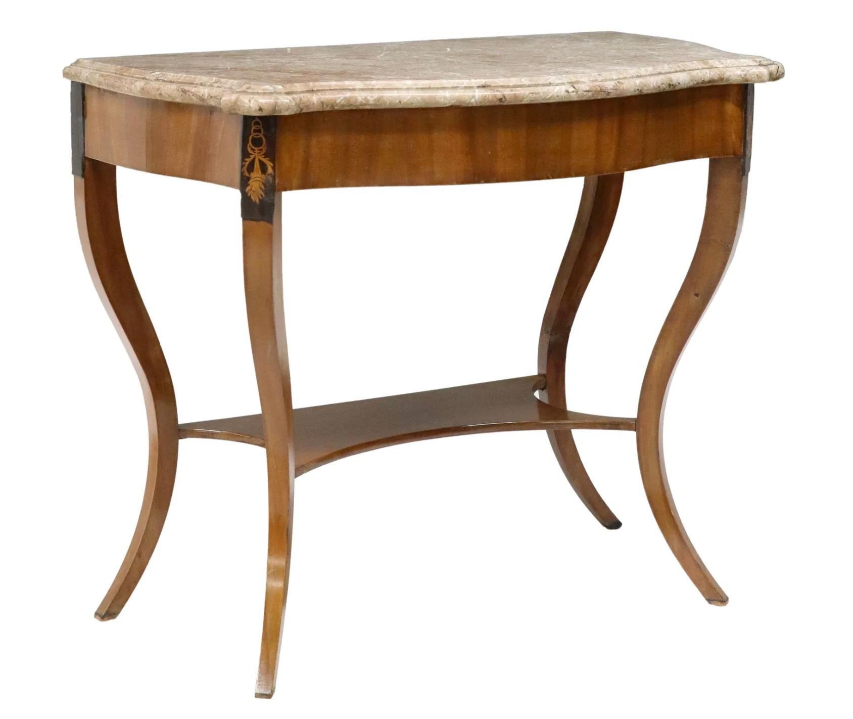 This exquisite Biedermeier-style console table showcases the timeless elegance of 19th-century German design. Crafted from rich mahogany, the piece features the sleek, understated lines characteristic of the Biedermeier aesthetic, emphasizing both