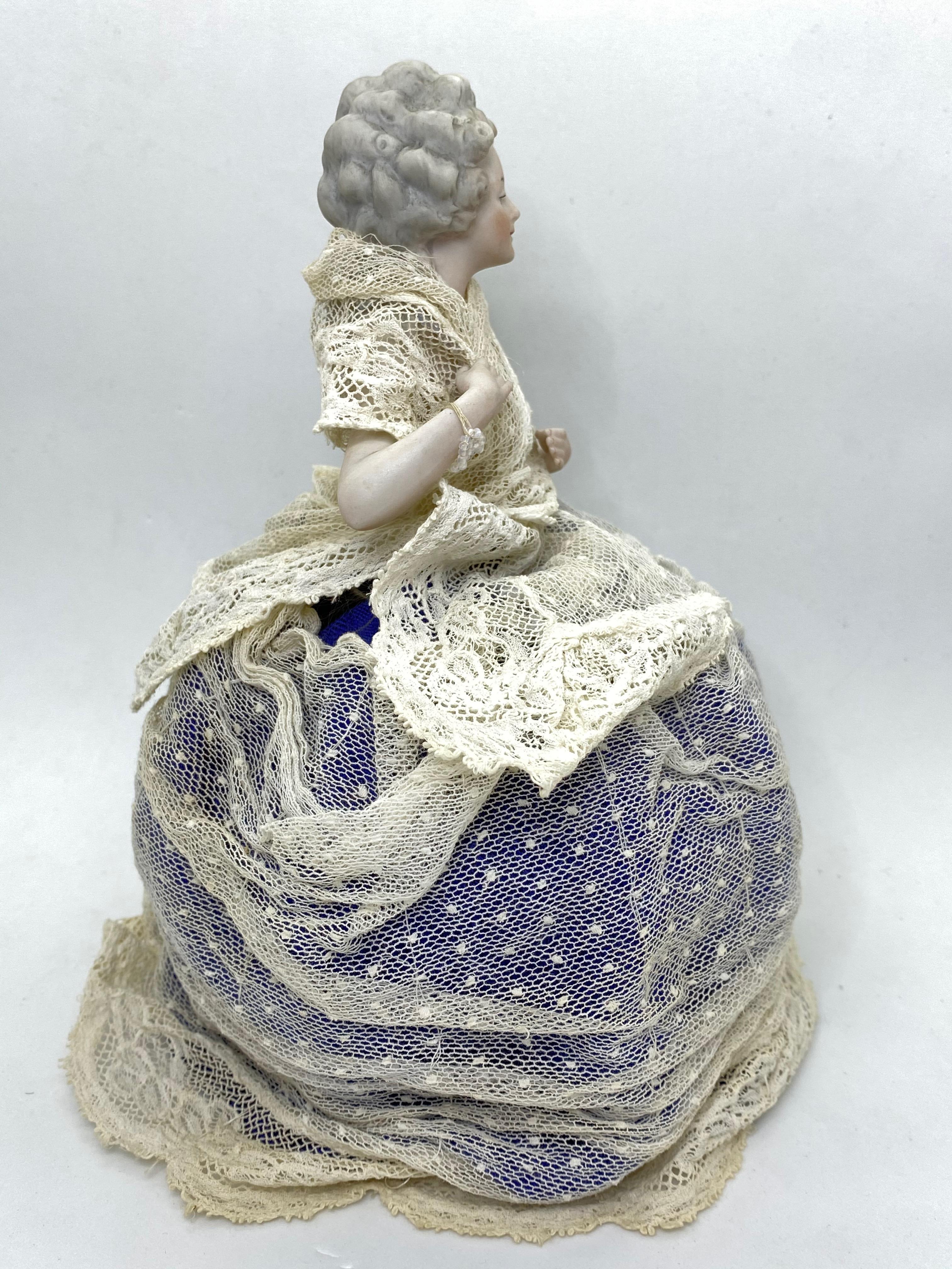 Early 20th Century German Bisque Porcelain Half Doll with Original Wire Lace Skirt Antique, 1910s For Sale