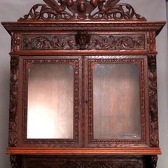 German Black Forest Figural Carved Oak Hunt Court Cupboard, circa 1890